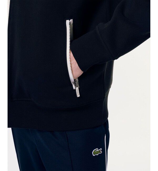 LACOSTE「アシンメトリーボーダーハイネック ドローストリング 鹿の子地 トラックジャケット」|スウェット・ジャージ|
