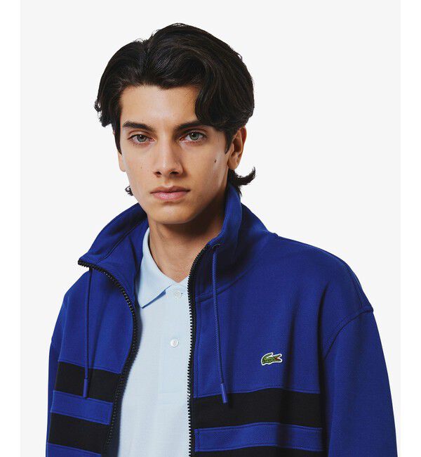 LACOSTE「アシンメトリーボーダーハイネック ドローストリング 鹿の子地 トラックジャケット」|スウェット・ジャージ|