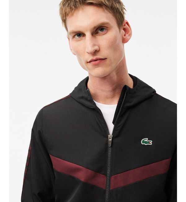 LACOSTE「撥水 スリーブテーピング ジップアップトラックフーディー / トラックジャケット」|パーカー|