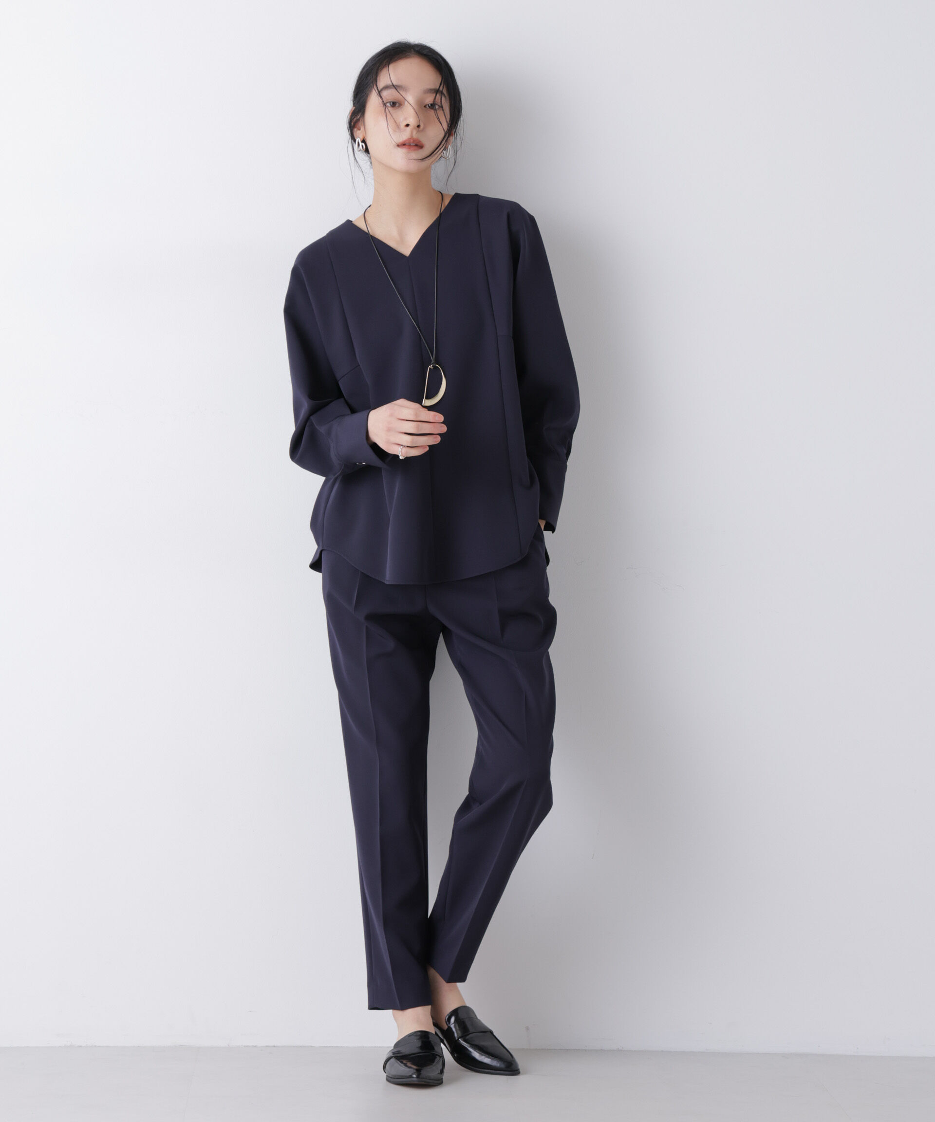 nano･universe「デイリーファンクション タックテーパードパンツ(セットアップ可)」|チノ|