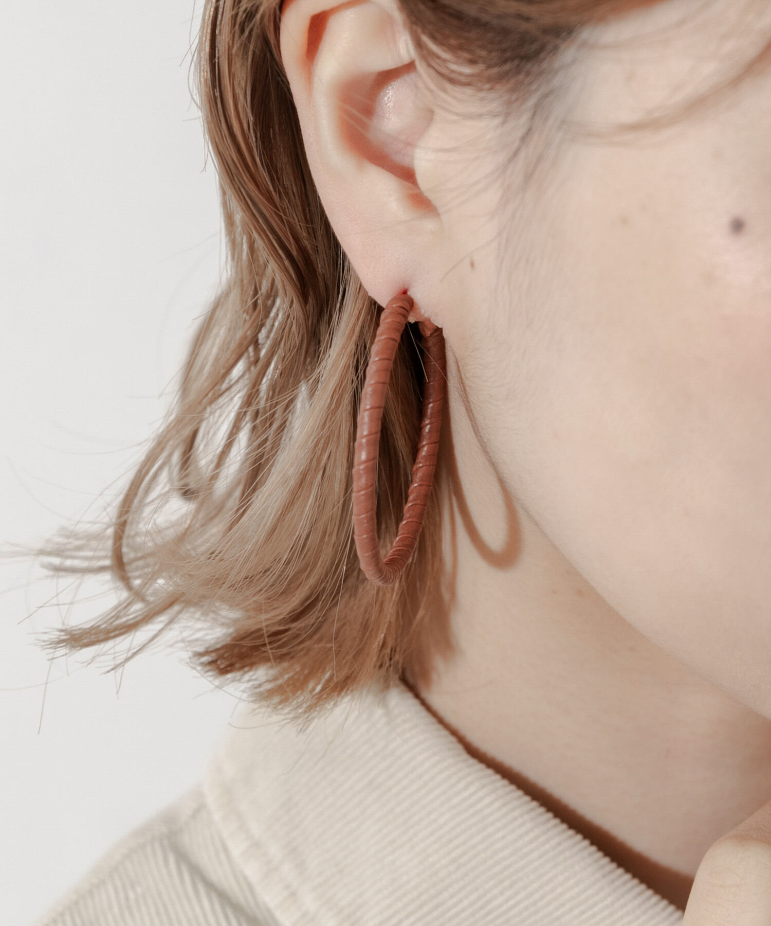 SMELLY「コードラップビッグフープピアス」|ピアス|