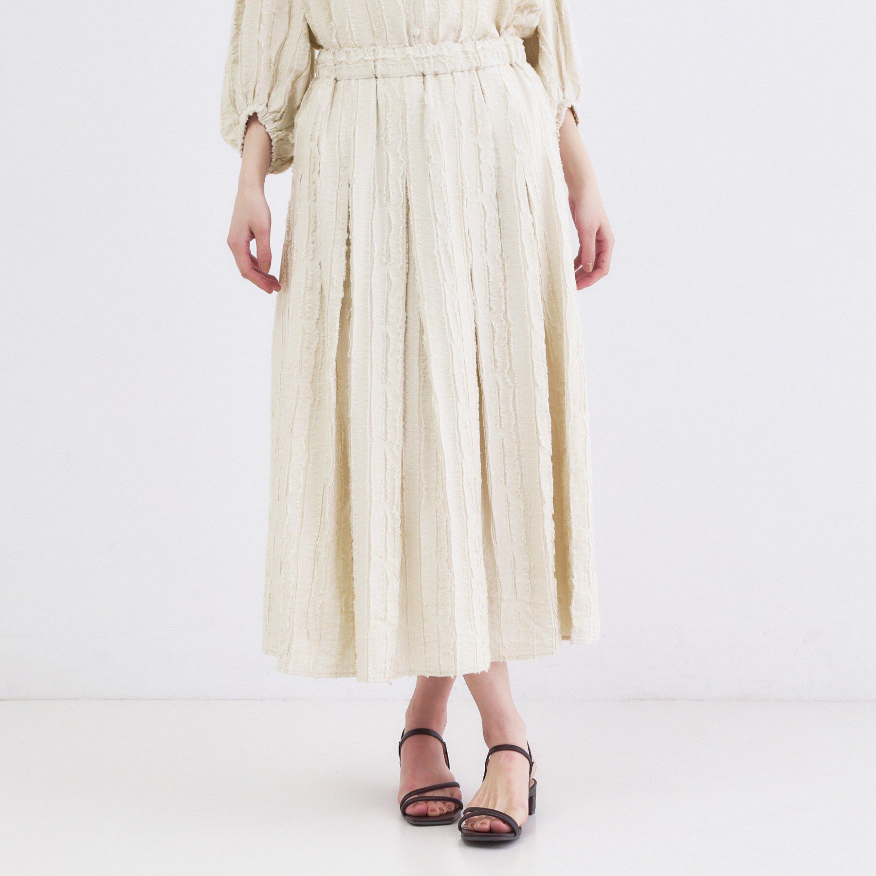 OPAQUE.CLIP「フリンジジャカード タックフレアスカート【洗濯機OK】」|スカート|