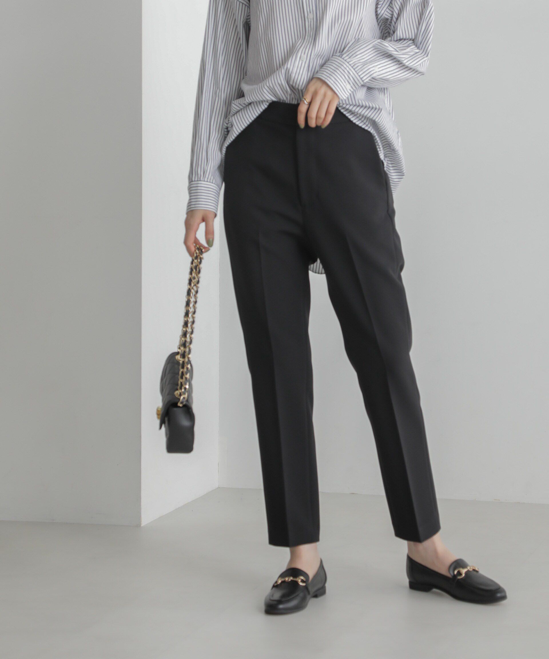 nano･universe「スリムテーパードパンツ」|スラックス|ブラック