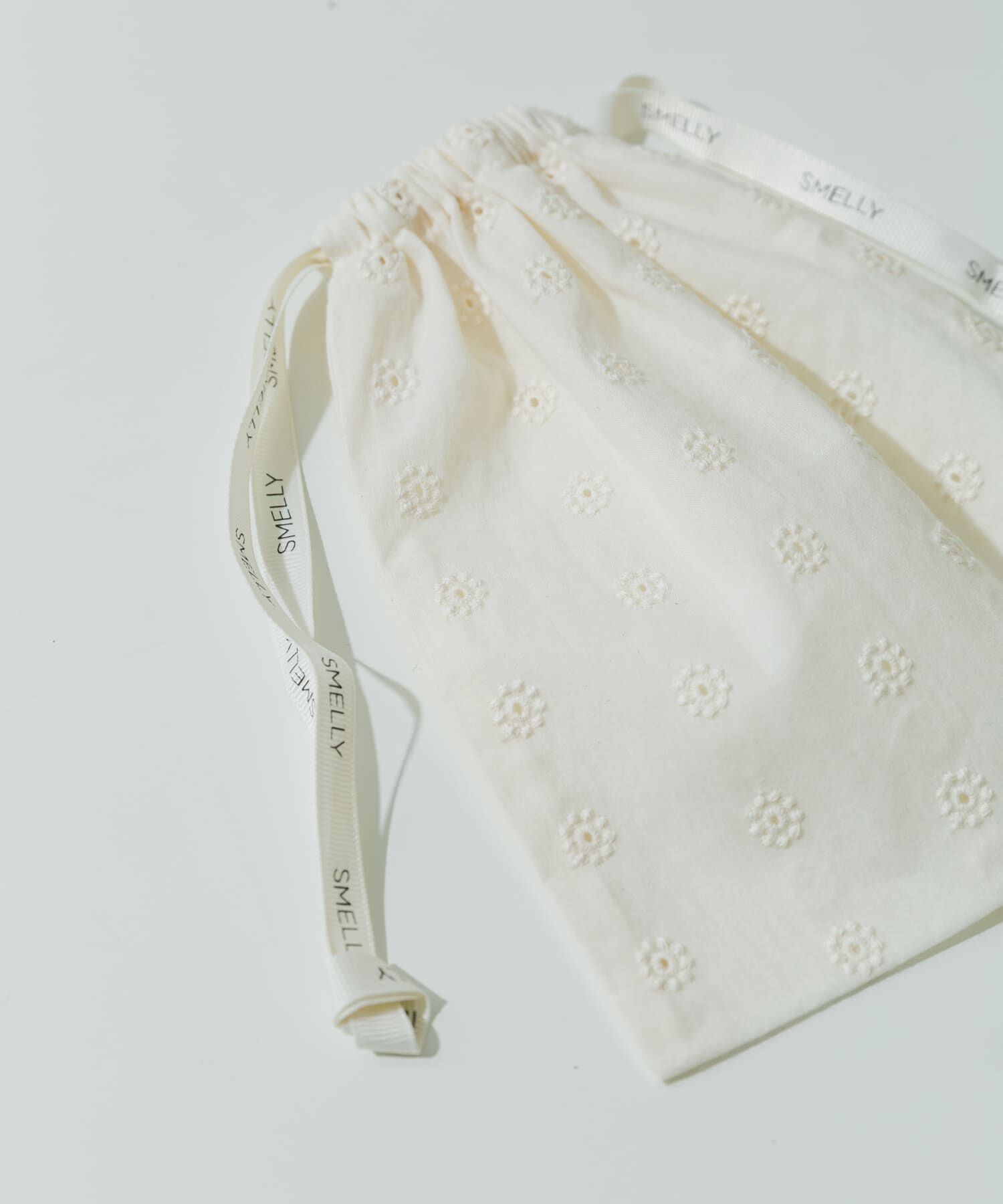 SMELLY「『WEB/一部店舗限定』プリントキンチャクポーチ」|ポーチ|