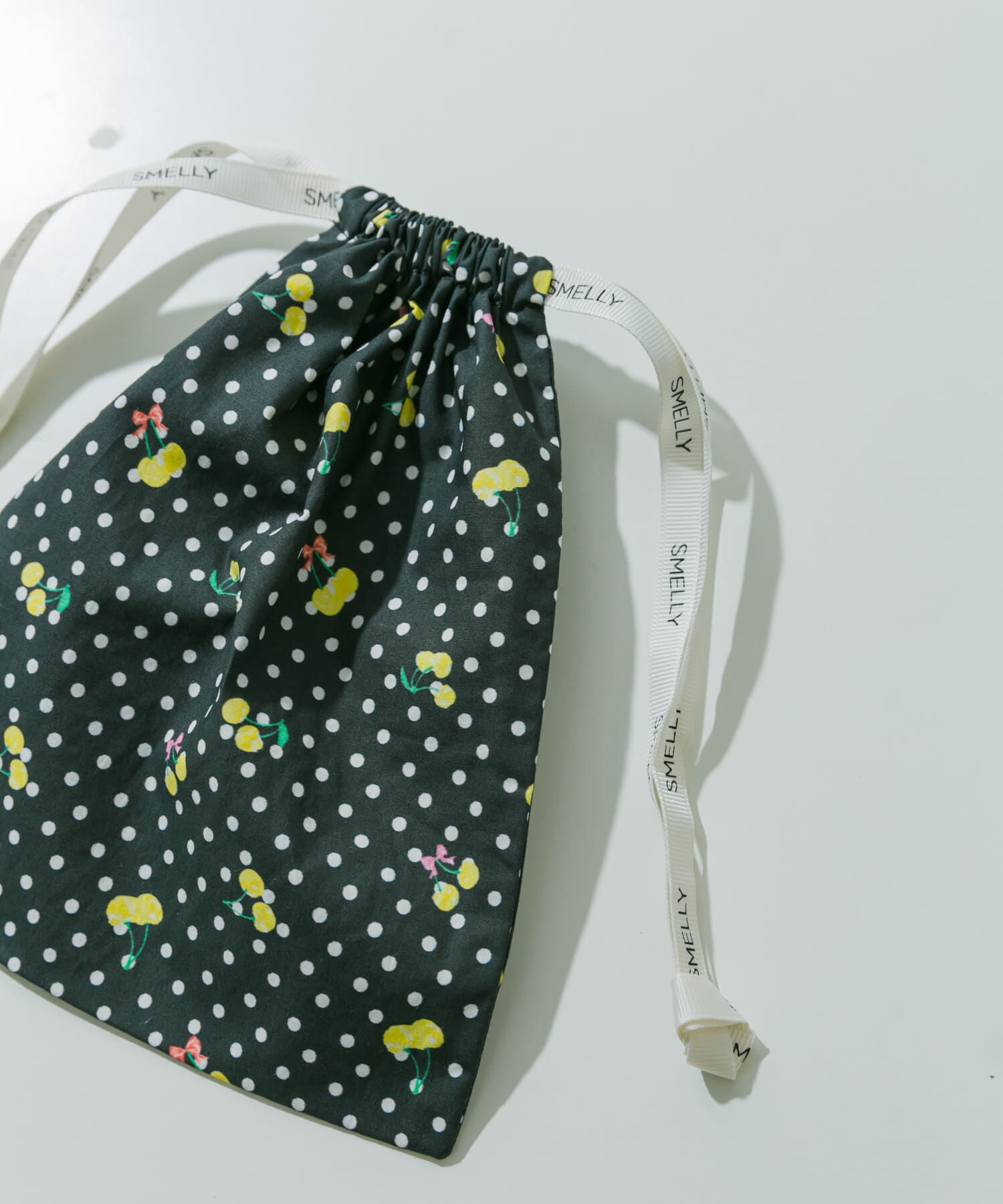 SMELLY「『WEB/一部店舗限定』プリントキンチャクポーチ」|ポーチ|