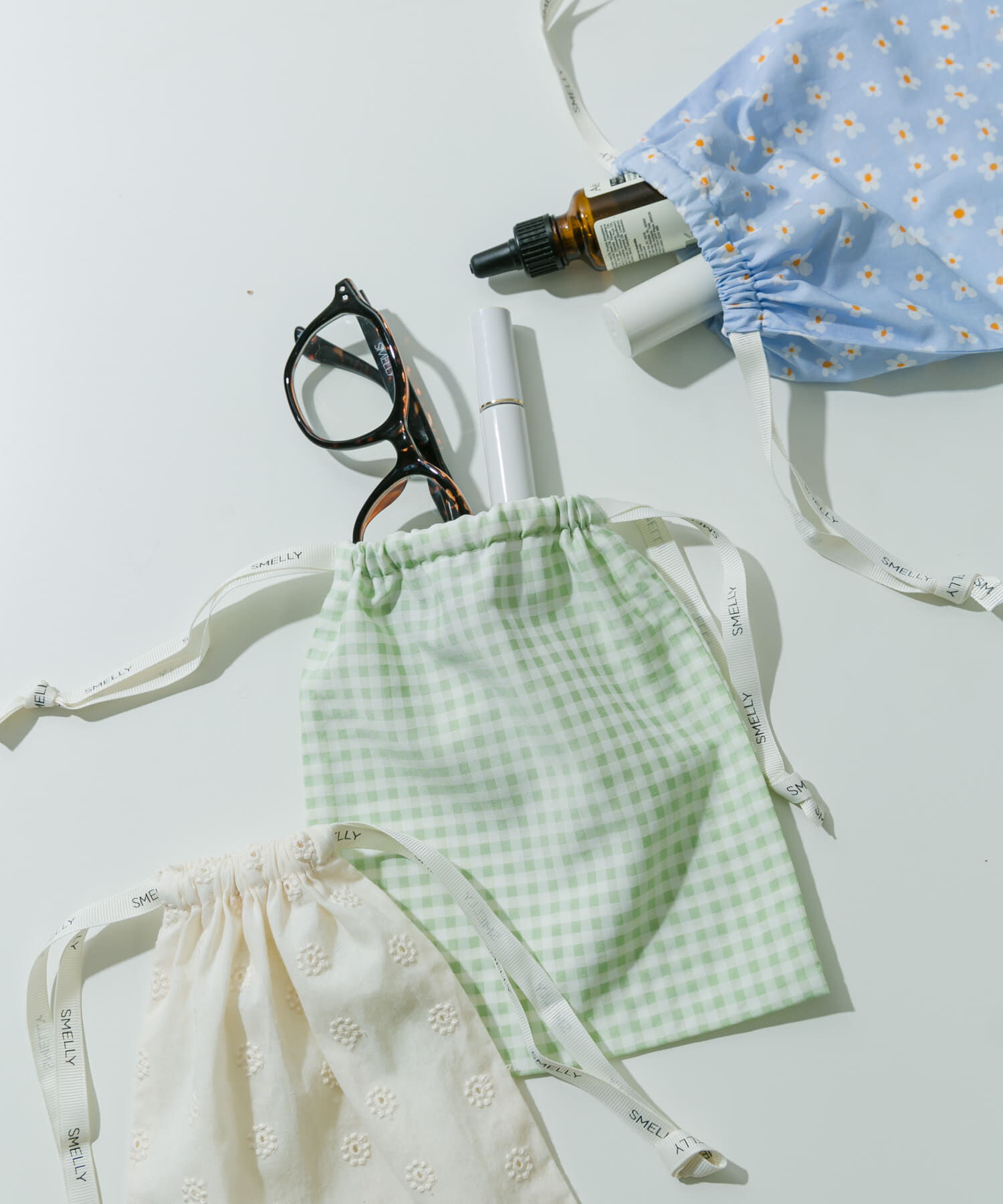 SMELLY「『WEB/一部店舗限定』プリントキンチャクポーチ」|ポーチ|