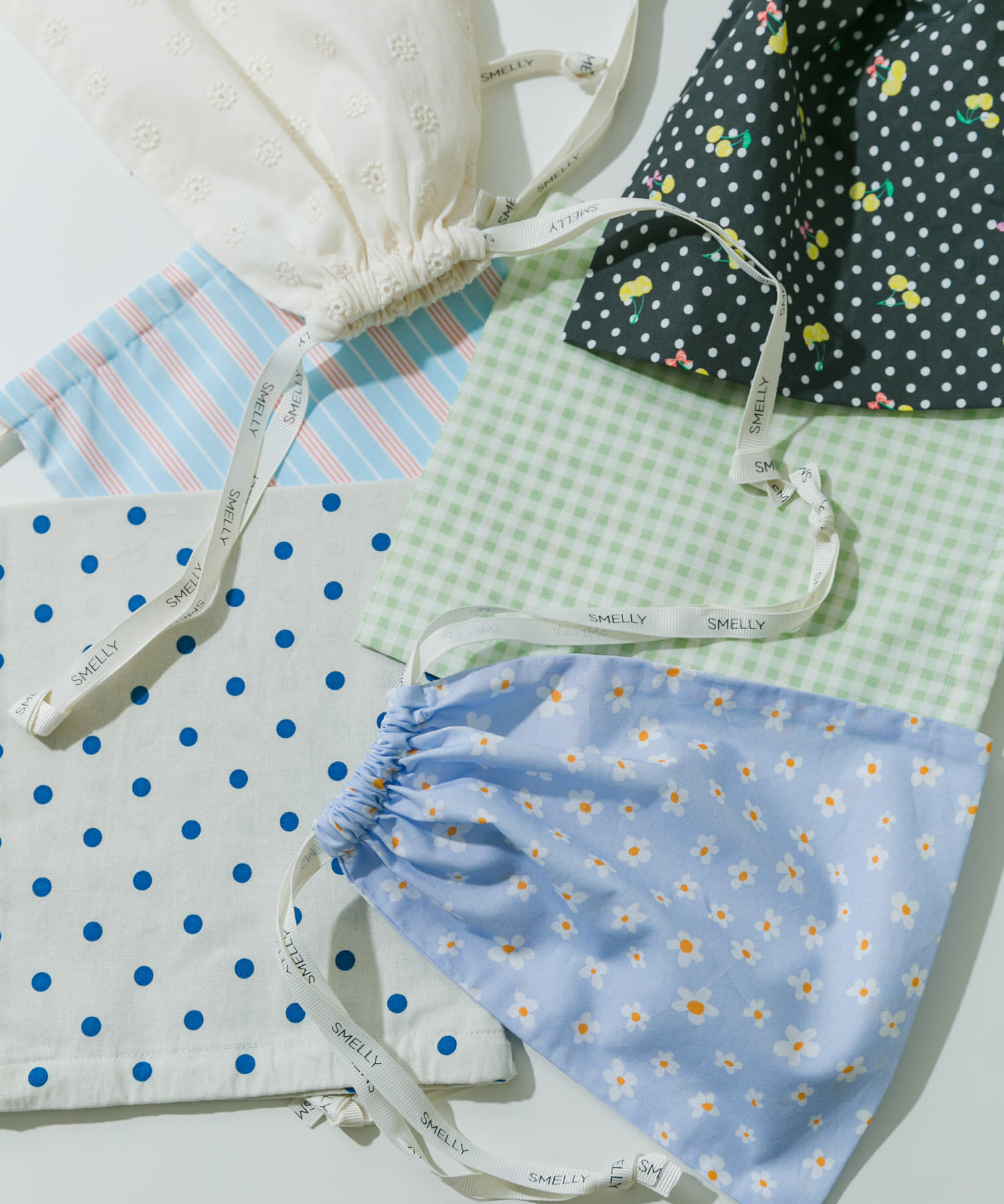 SMELLY「『WEB/一部店舗限定』プリントキンチャクポーチ」|ポーチ|