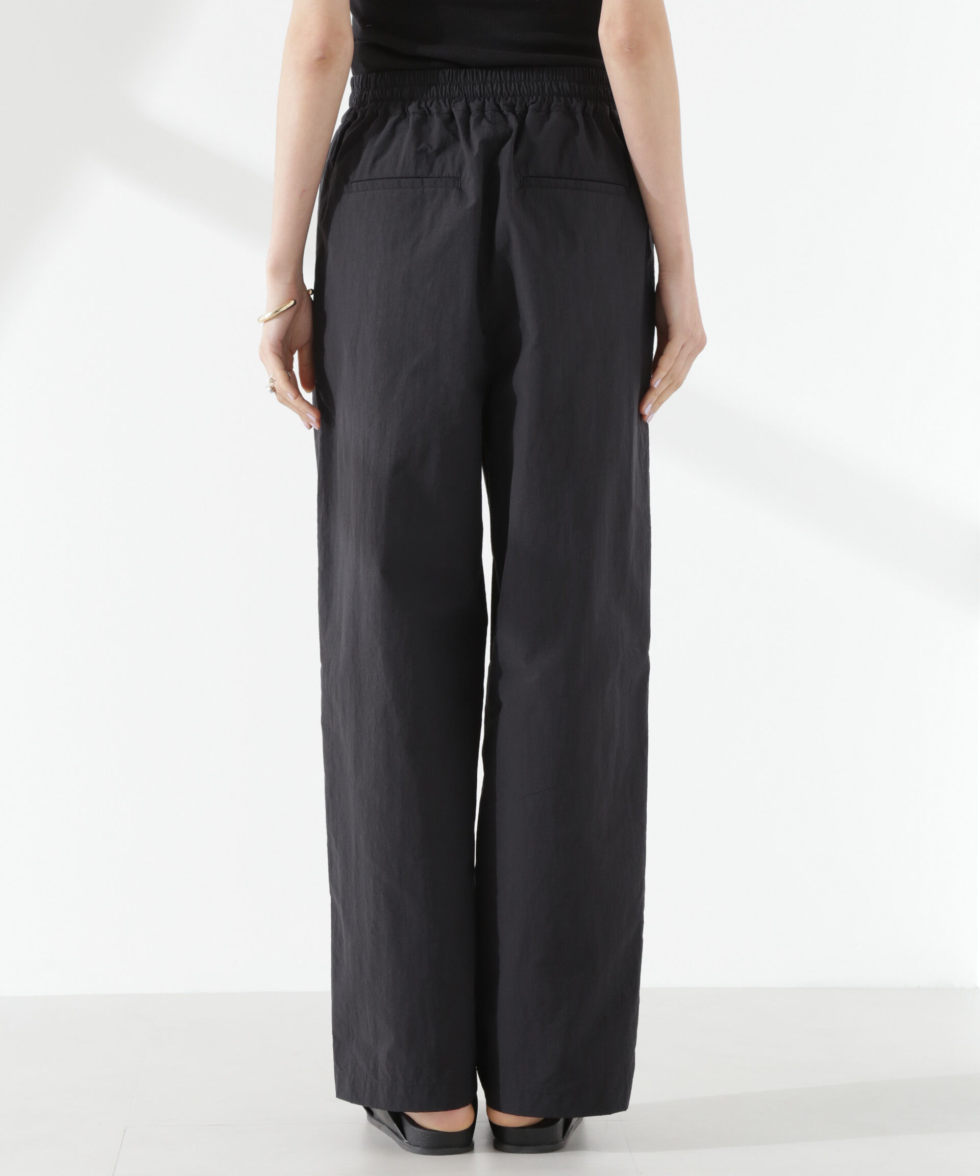 nano･universe「タスランワイドイージーパンツ」|チノ|