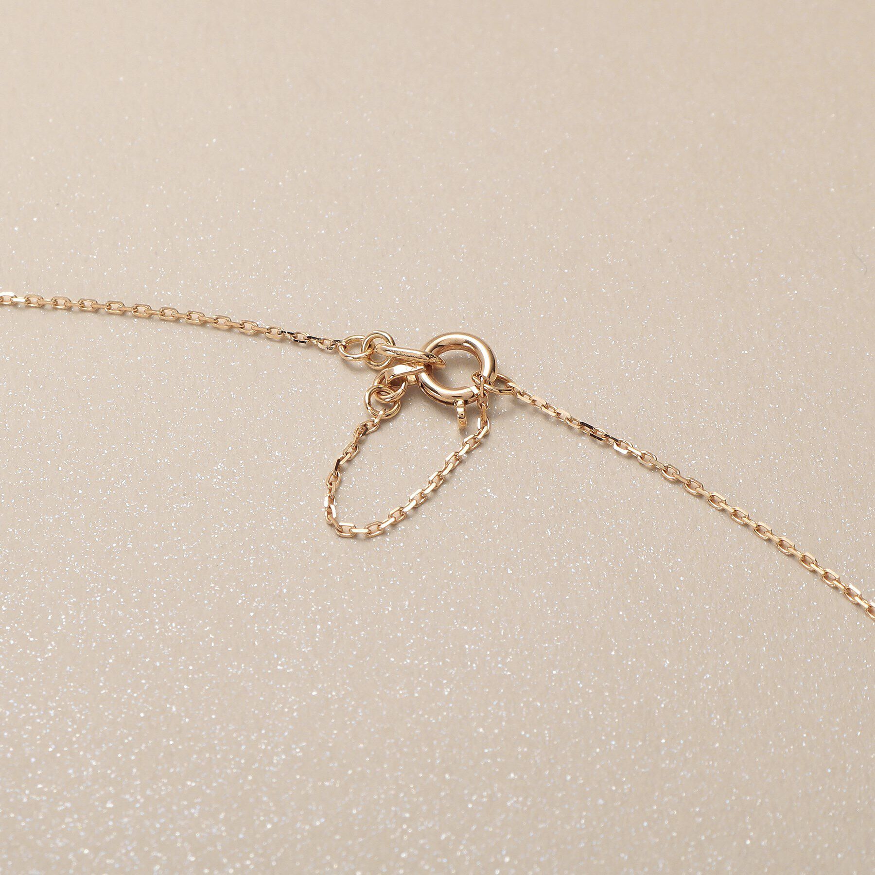 COCOSHNIK「K10ダイヤモンド アシンメトリークロス ネックレス」|ネックレス|