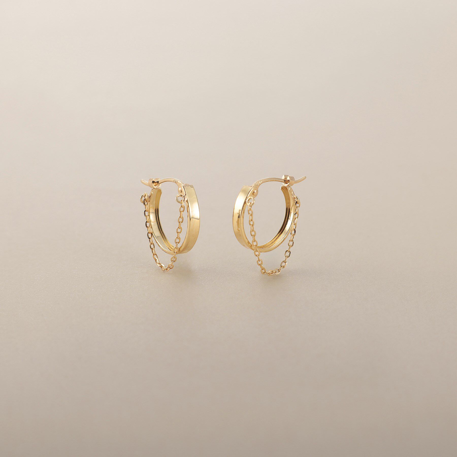 COCOSHNIK「K10チェーンドレープ フープピアス」|ピアス|