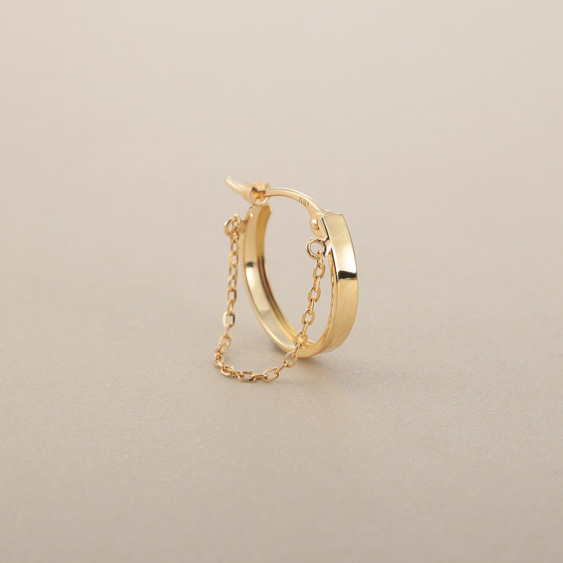 COCOSHNIK「K10チェーンドレープ フープピアス」|ピアス|