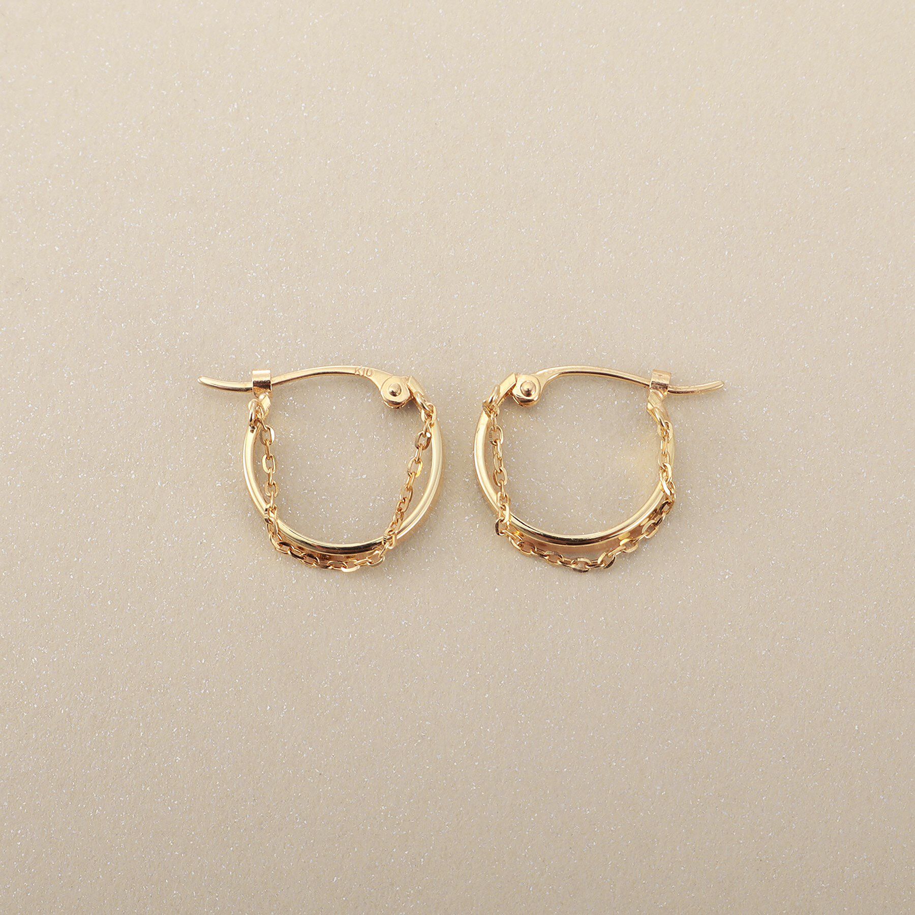 COCOSHNIK「K10チェーンドレープ フープピアス」|ピアス|