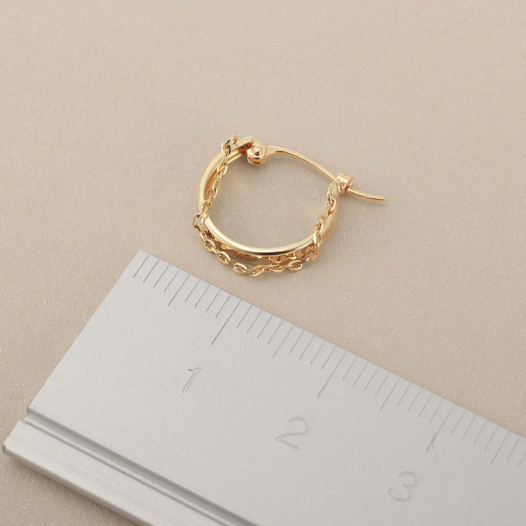 COCOSHNIK「K10チェーンドレープ フープピアス」|ピアス|