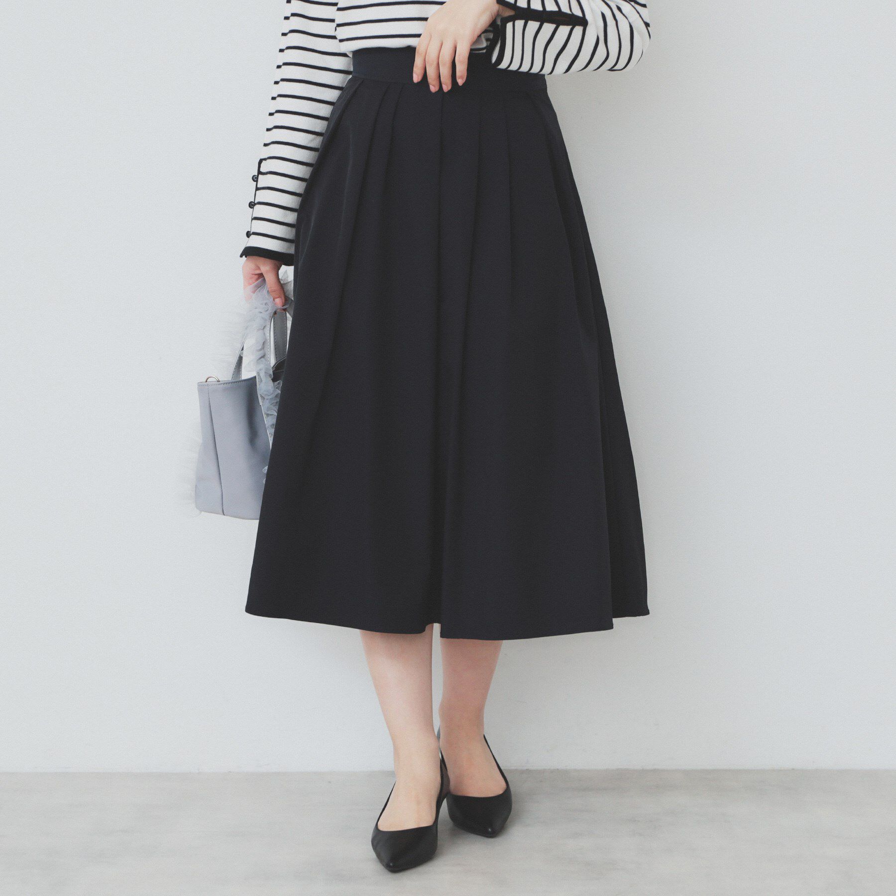 index「アシメタックフレアスカート【洗濯機洗い可/イージーアイロン】」|スカート|ネイビー(094)
