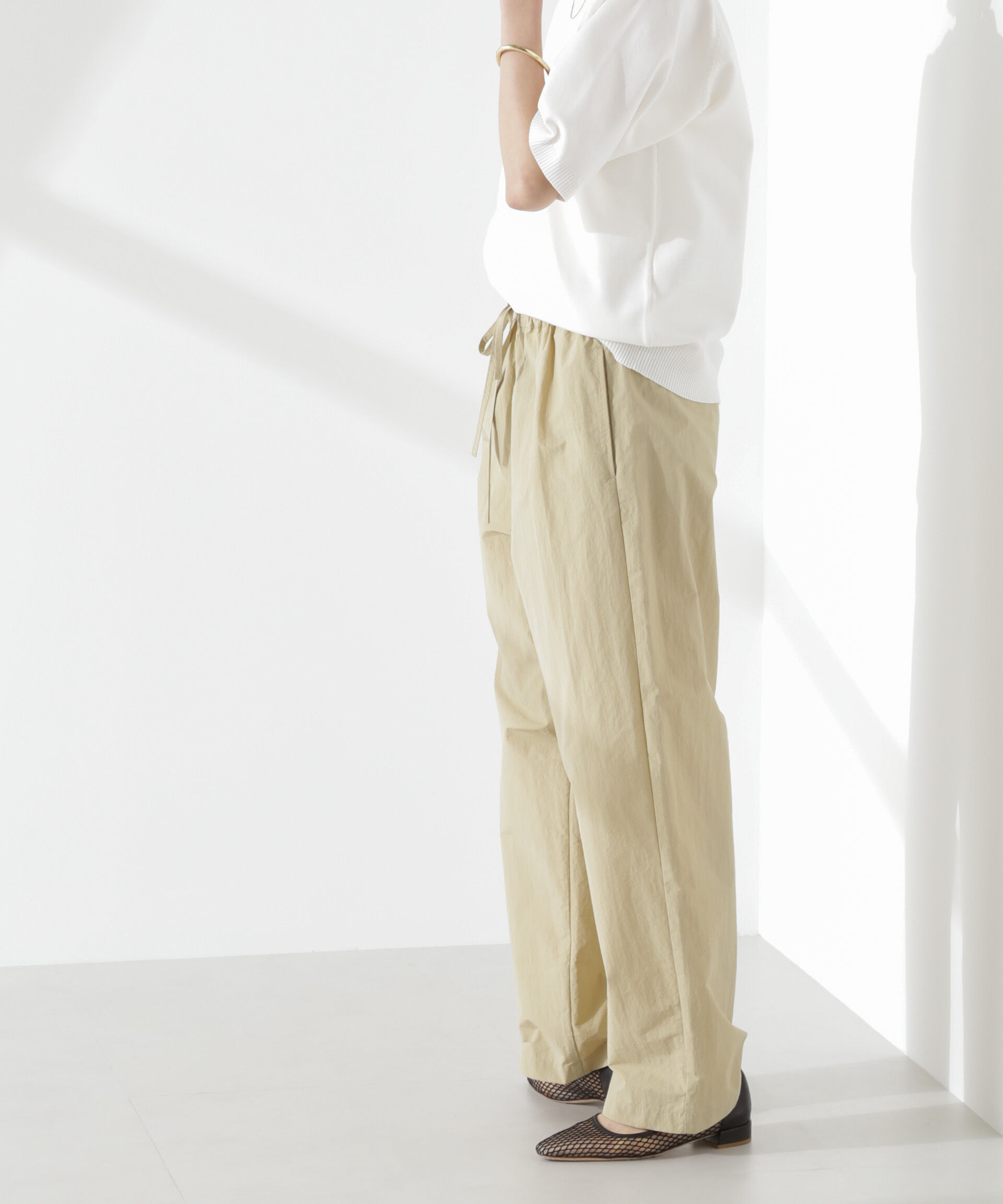 nano･universe「タスランワイドイージーパンツ」|チノ|