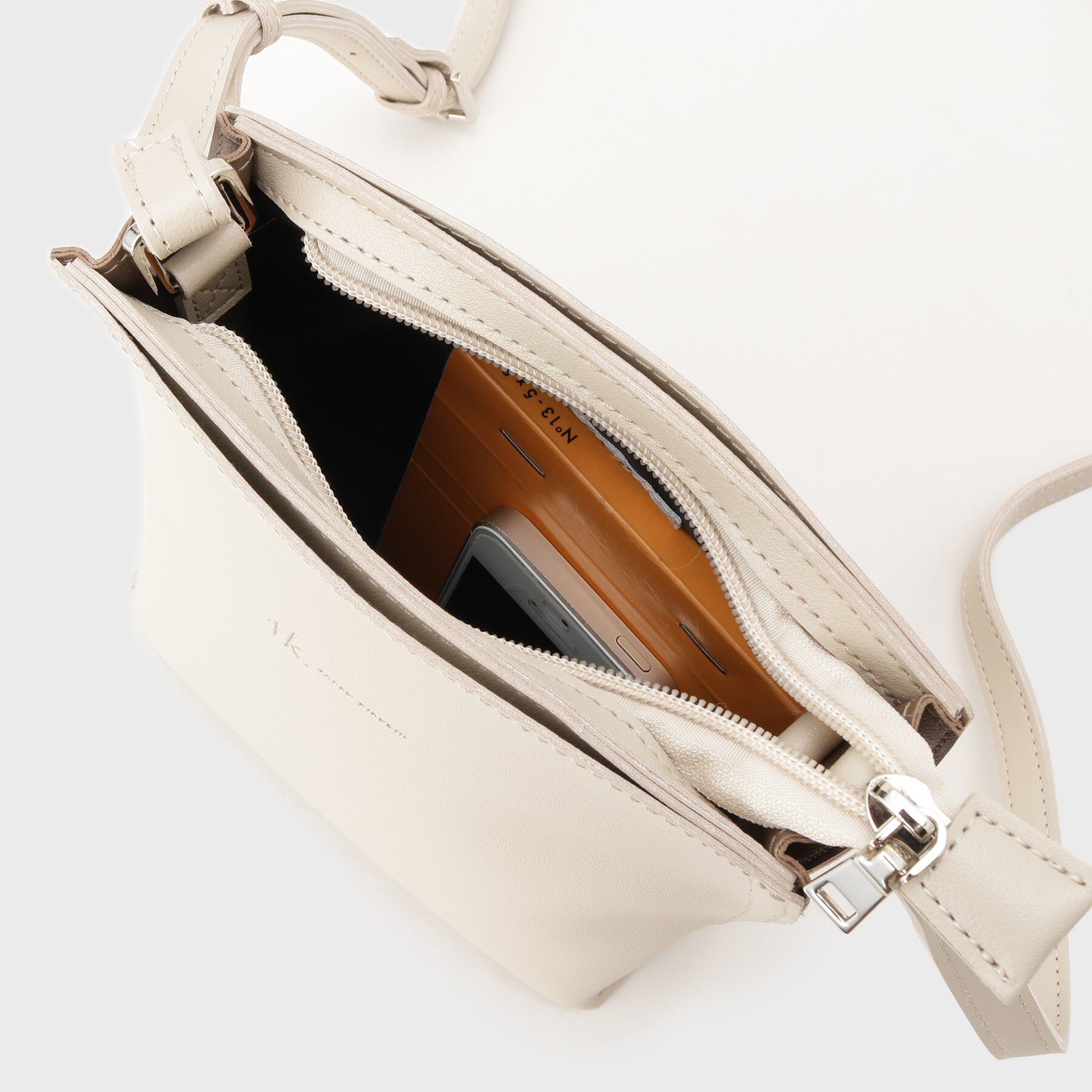 tk.TAKEO KIKUCHI「ラウンドミニショルダー」|ショルダー・メッセンジャー|