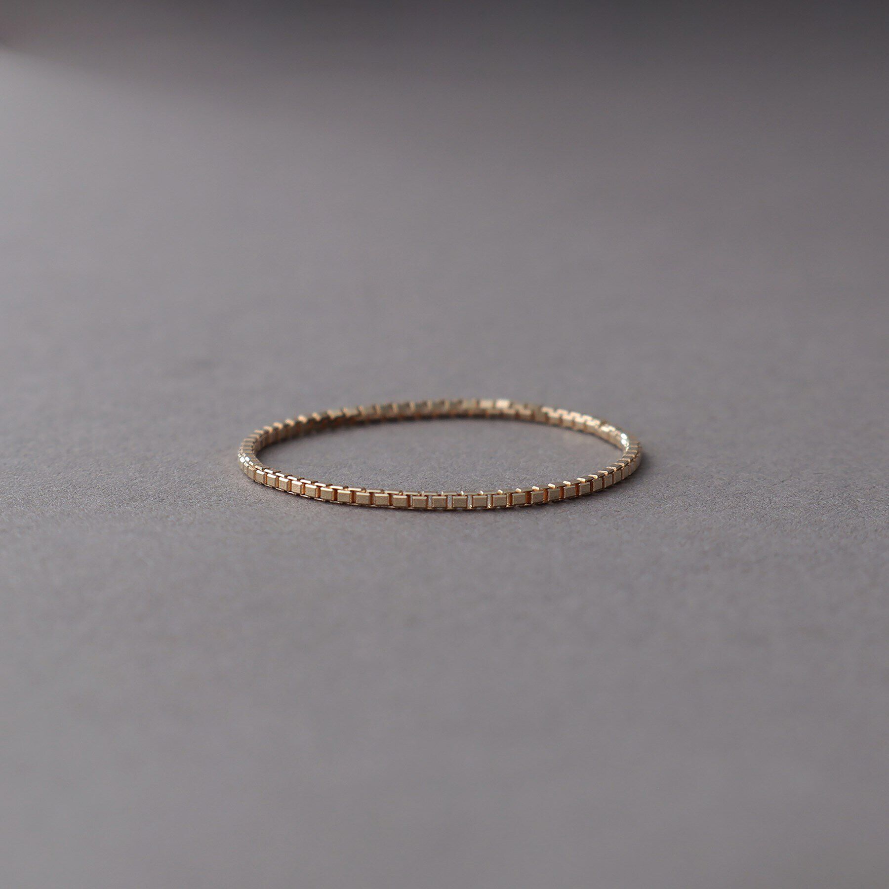 COCOSHNIK ONKITSCH「K10スキニーリング ベネチアン」|リング|