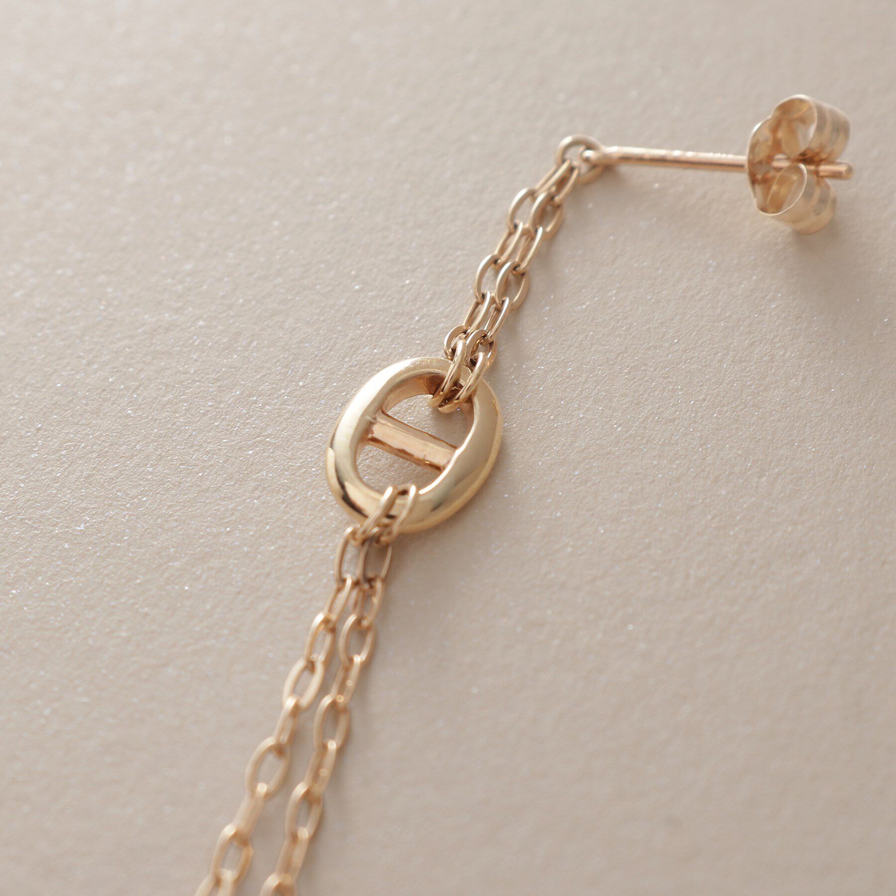 COCOSHNIK「K10マリンモチーフチェーンフリンジ スタッドピアス」|ピアス|