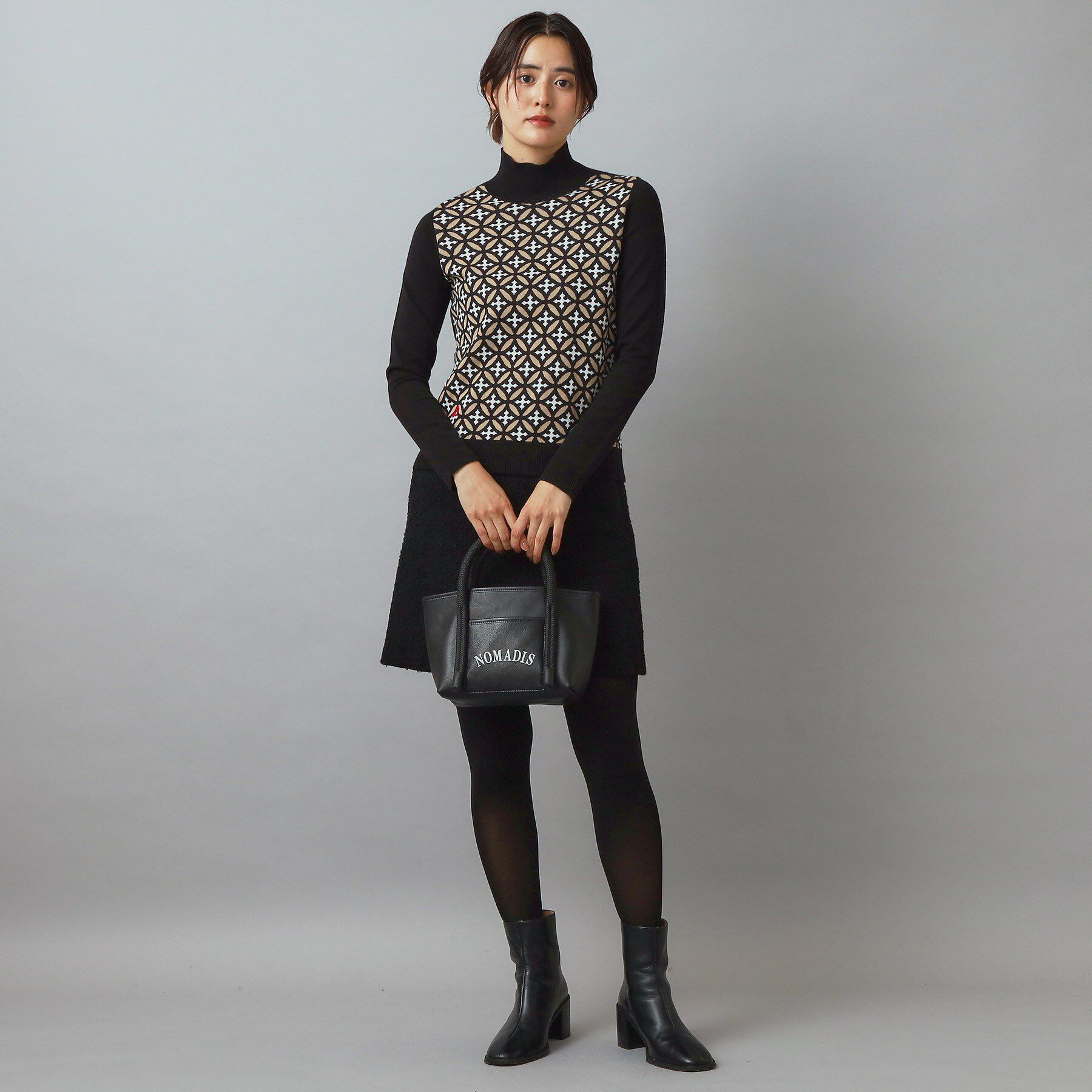 DRESSTERIOR「オーバーラップサークルタートルネック」|ニット・セーター|