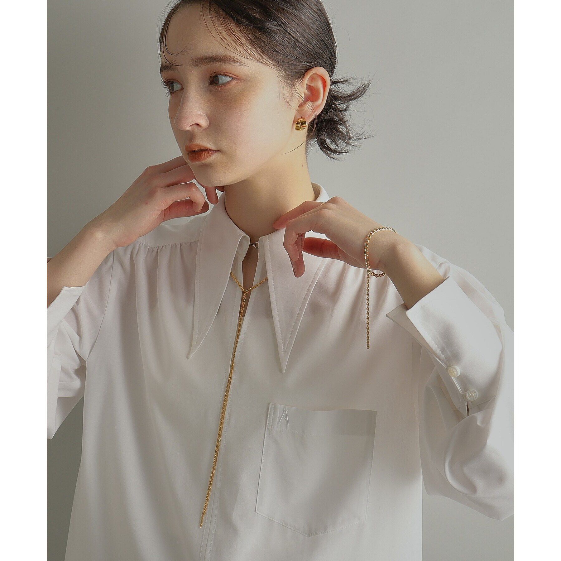 COCOSHNIK ONKITSCH「シルバー フォールディングピアス オーバーラップ GP」|ピアス|