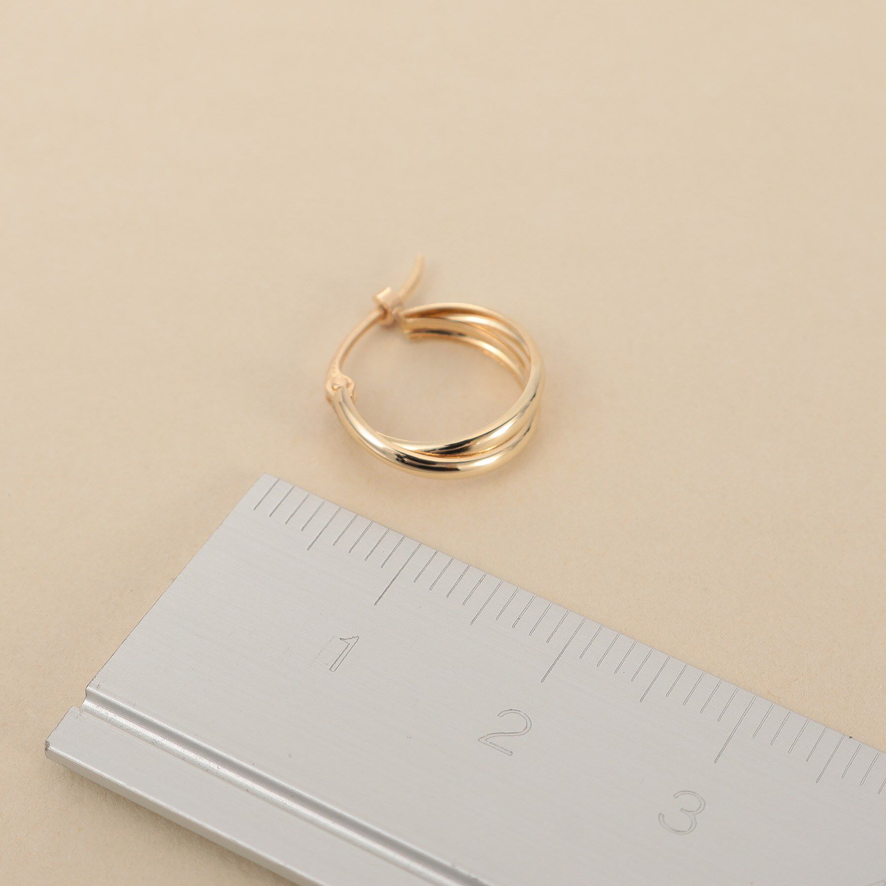 COCOSHNIK ONKITSCH「K10ドームクロスフープピアス」|ピアス|