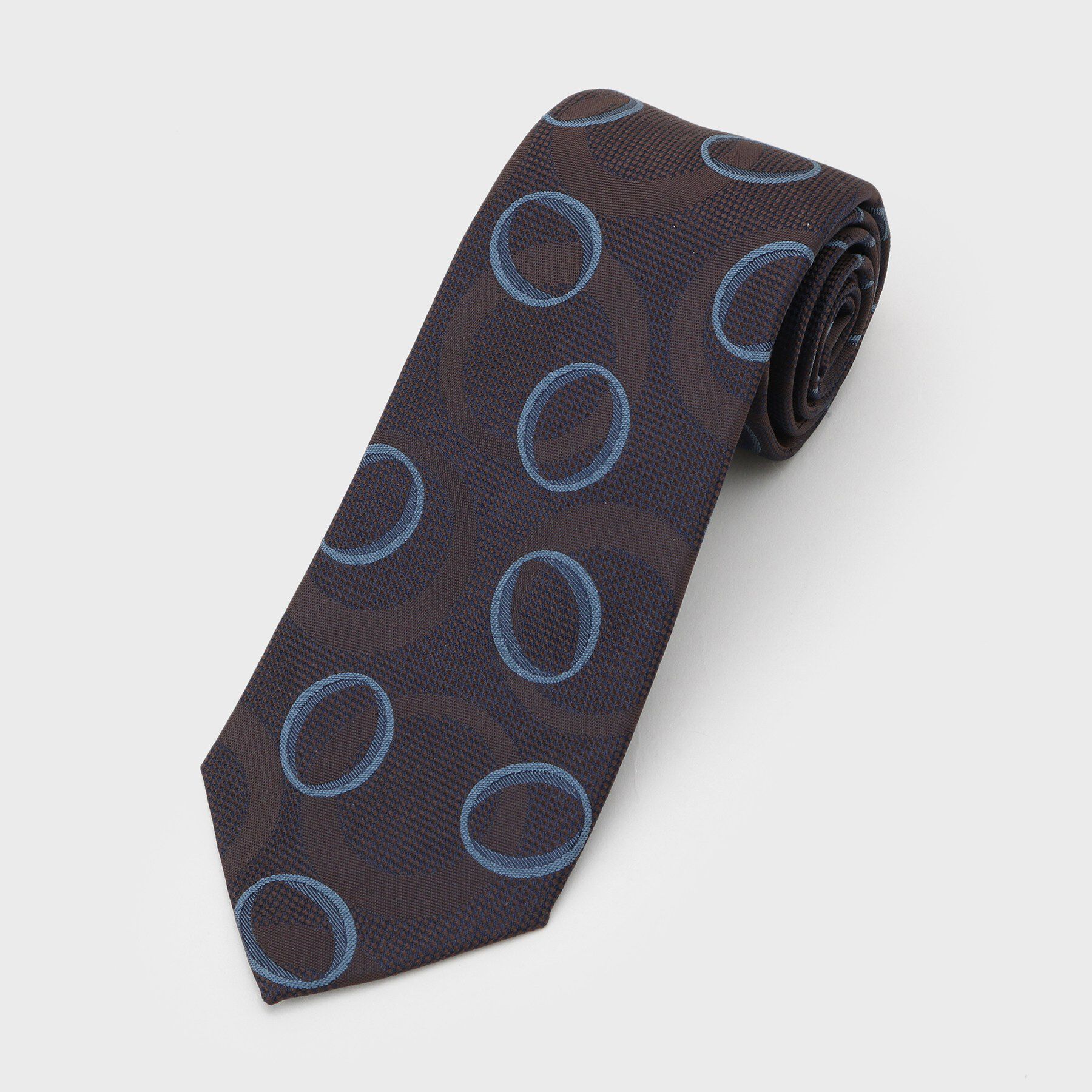 TAKEO KIKUCHI「【縁起の良いネクタイ】PNJ 巴（ともえ）紋ジオメトリックネクタイ」|ネクタイ・蝶ネクタイ|ブラウン(543)