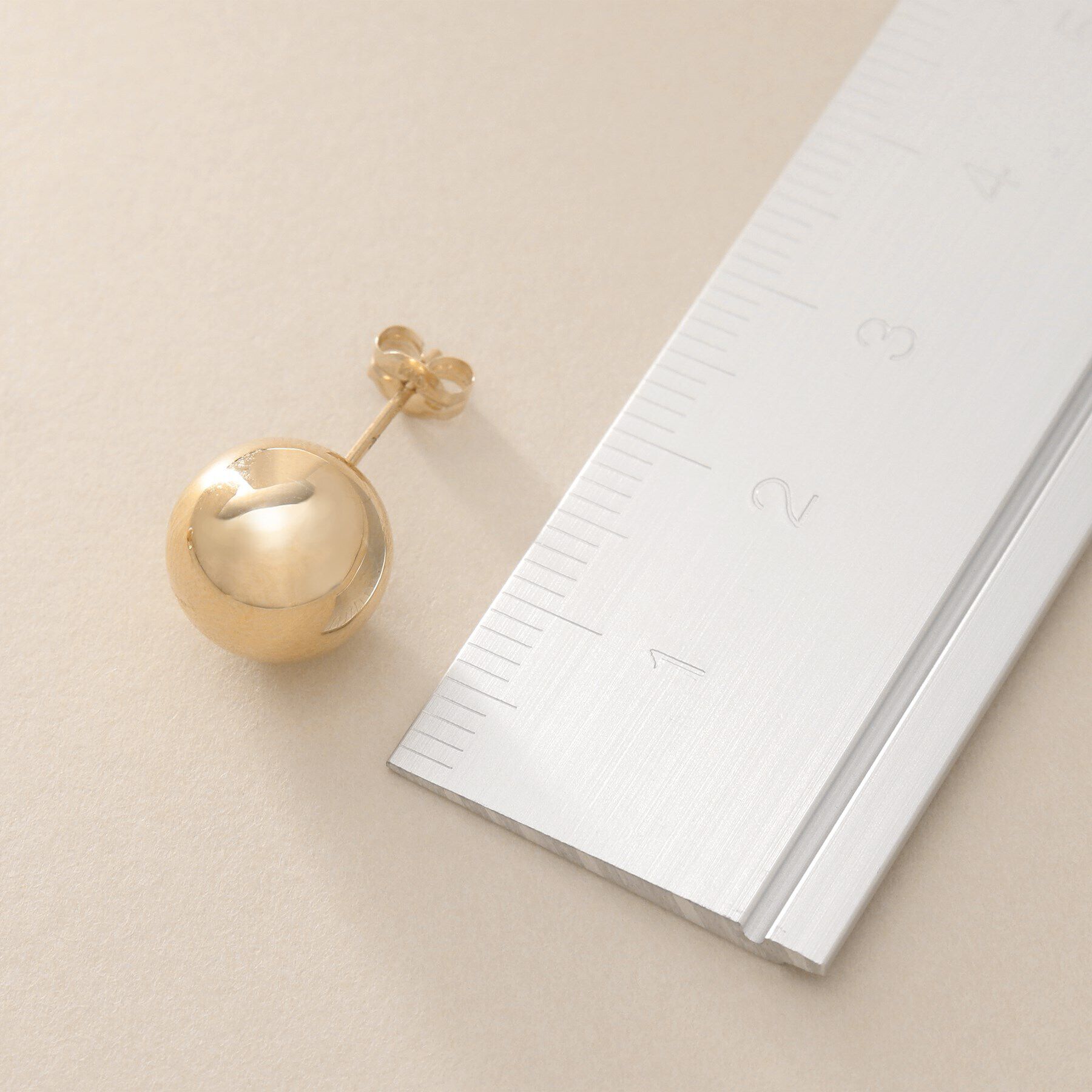 COCOSHNIK「K10中空ボール スタッドピアスL」|ピアス|