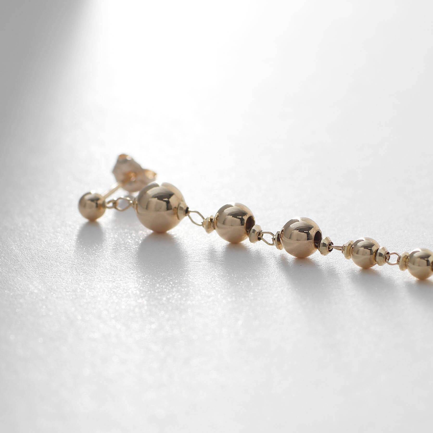 COCOSHNIK「K10中空ボール目開けグラデーション スタッドピアス」|ピアス|