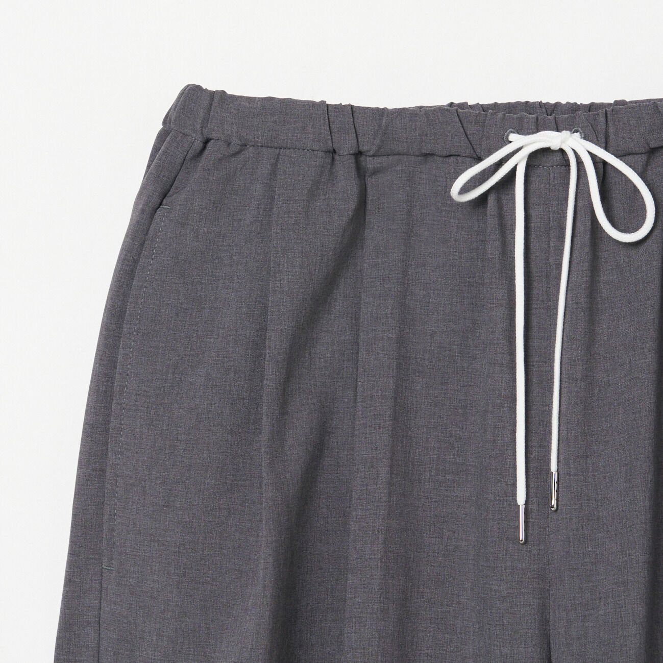 HELIOPOLE「HELIOPOLE BARREL LEG TUCK PANTS」|チノ|