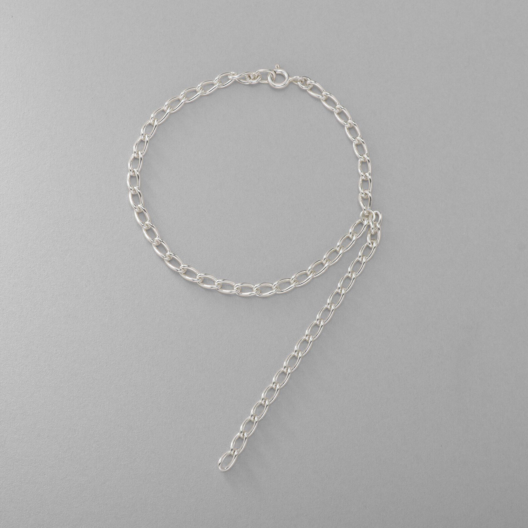 COCOSHNIK ONKITSCH「シルバー ハンギングロングカーブチェーン ブレスレット」|ブレスレット・バングル|