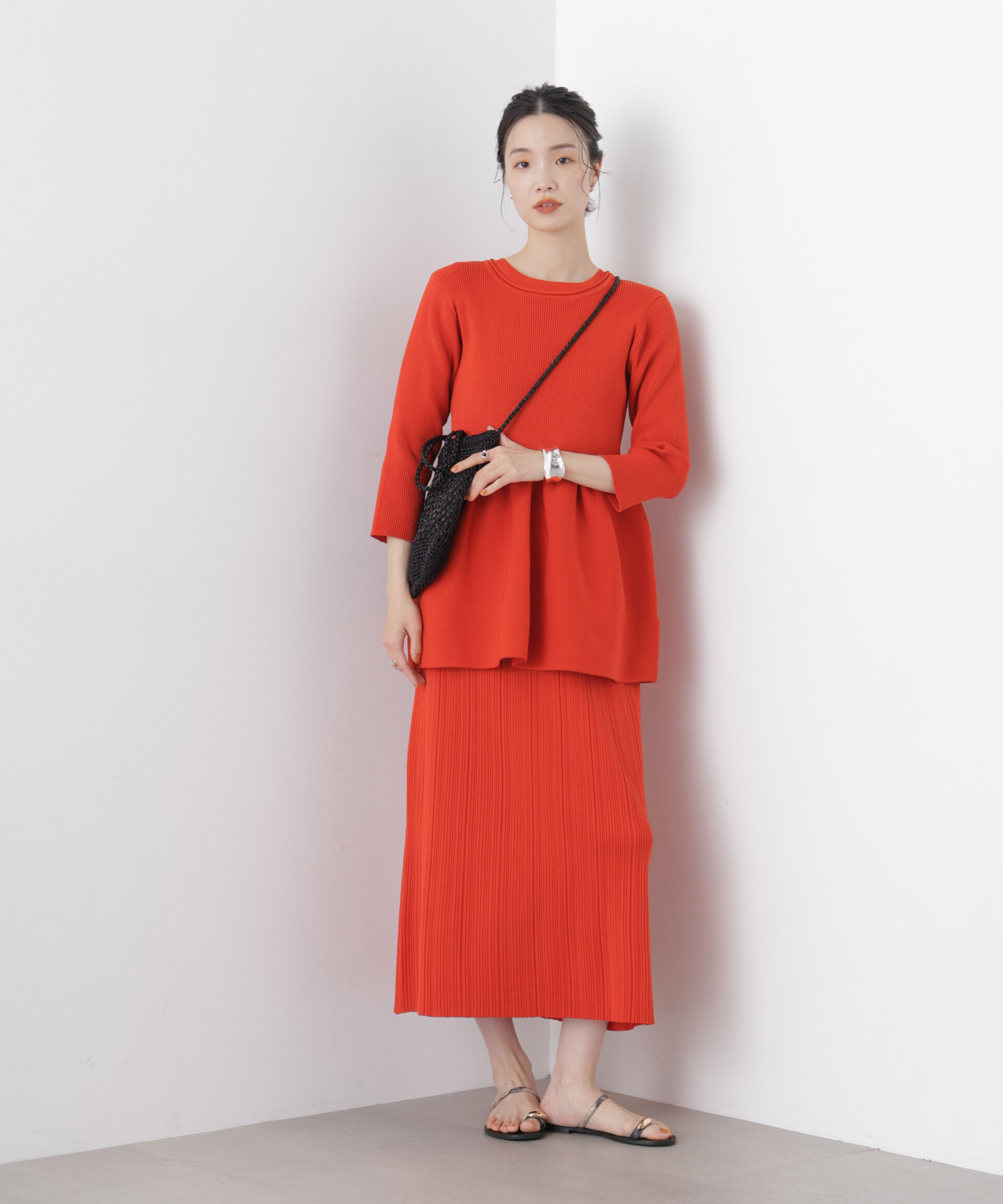 nano･universe「洗濯機洗い可スポンディッシュニットペプラムシルエットトップス」|ニット・セーター|