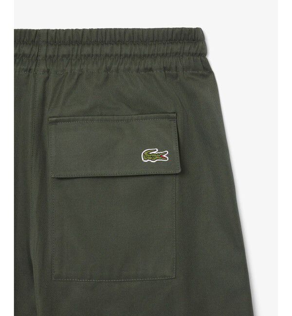LACOSTE「アシンメトリー ワイドストレート カーゴポケットパンツ」|サルエル|