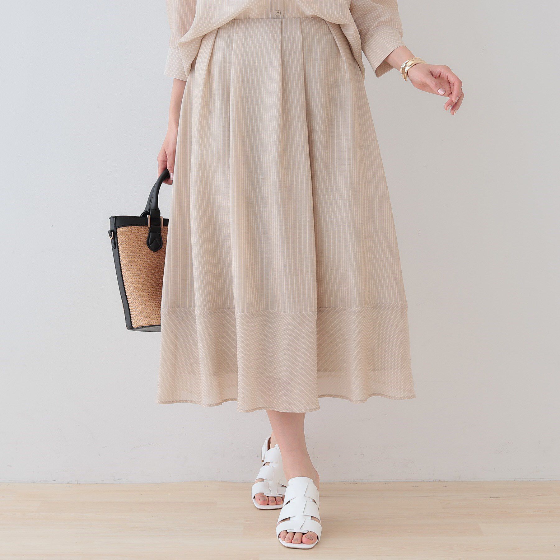 INDIVI「新色登場！【洗える／エアリー素材】巻き風ロングスカート」|スカート|