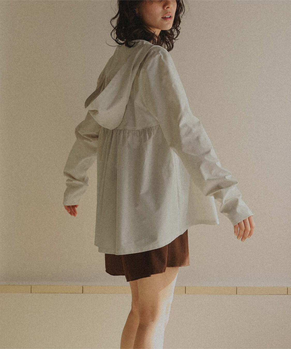 titivate「ヘムラインギャザーデザインパーカー/ラッシュガード」|ビキニトップス|