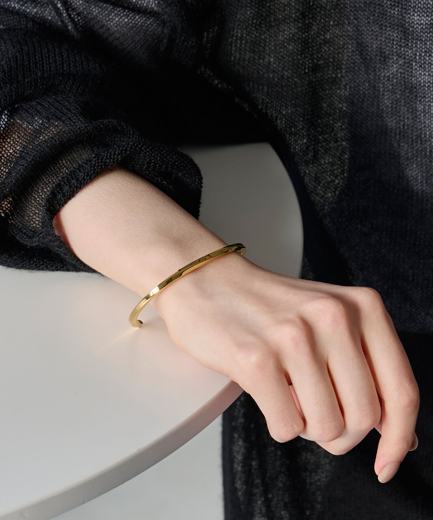 Phoebe「【金属アレルギー対応】ライトツイストメタルバングル/サージカルステンレス」|ブレスレット・バングル|ゴールド