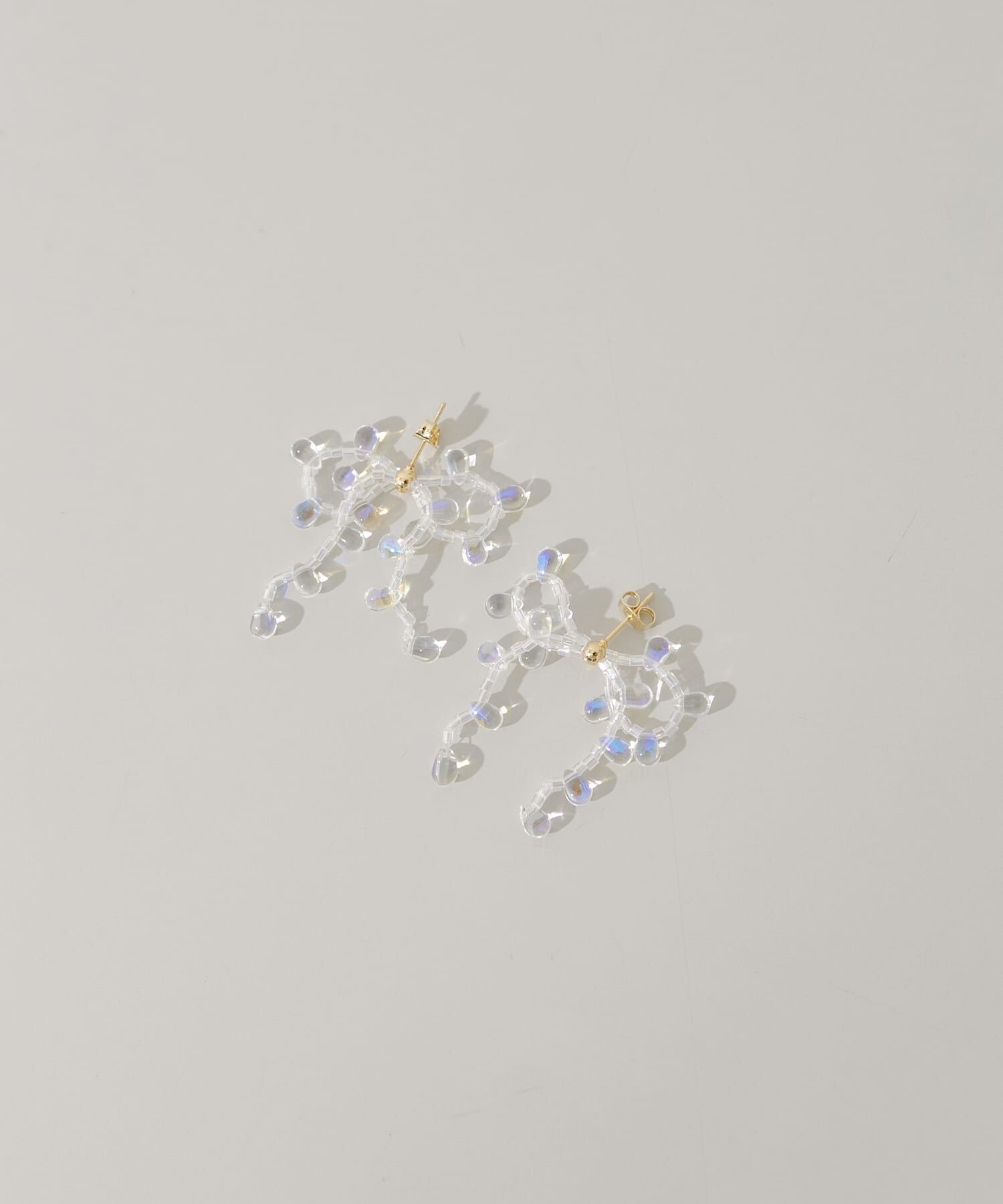 SMELLY「クリアビーズリボンピアス」|ピアス|