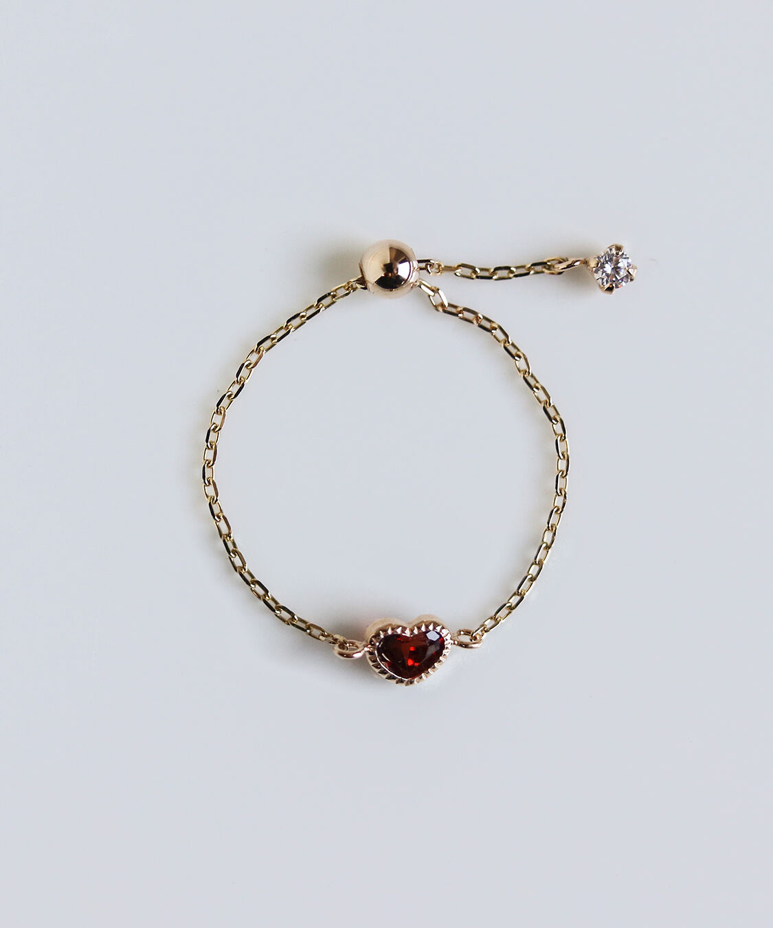  「ガーネット ハート チェーンリング | K10YG 〈Web限定〉」|リング|