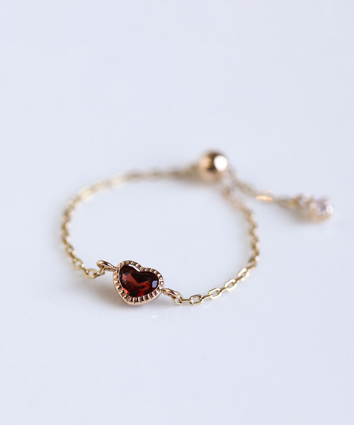  「ガーネット ハート チェーンリング | K10YG 〈Web限定〉」|リング|