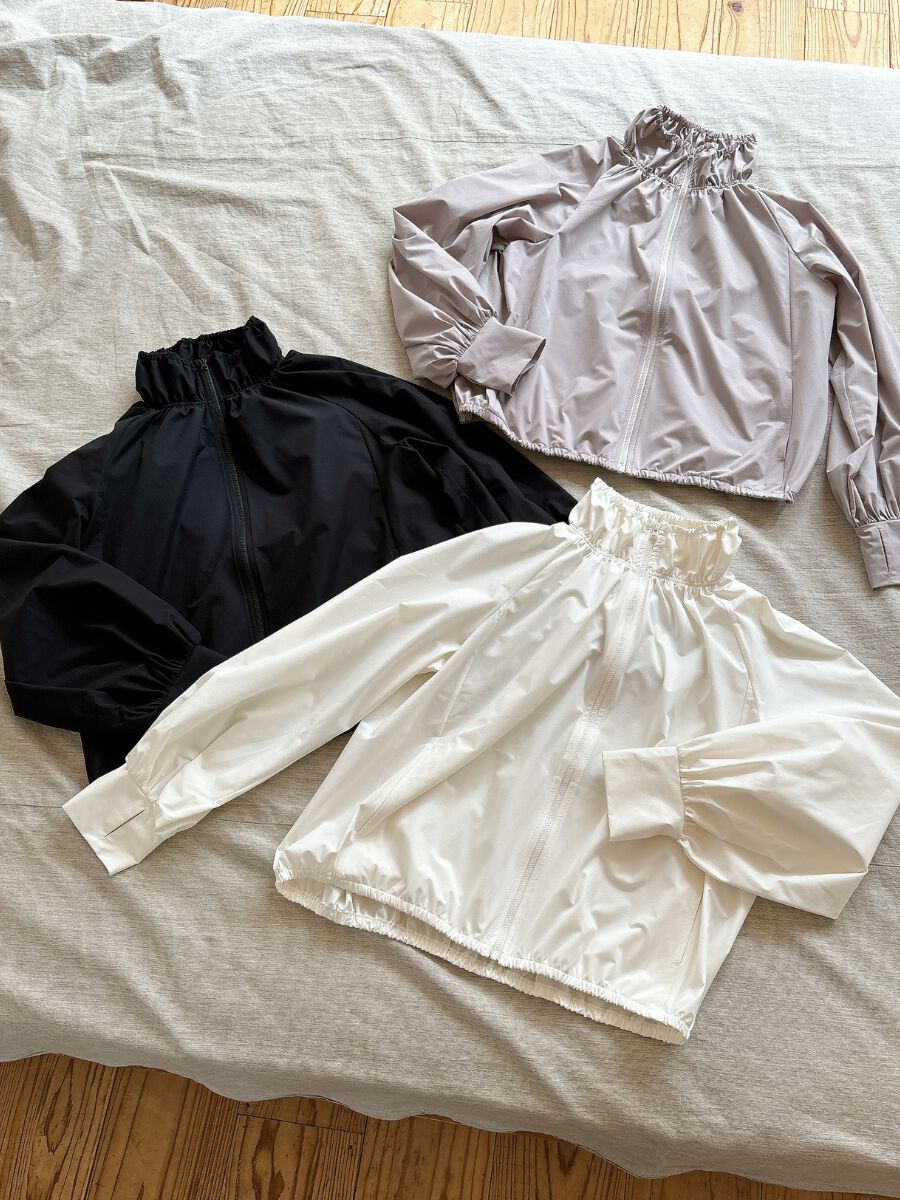 ALBOVE「UVカットスタンドネック撥水ギャザーブルゾン」|レインコート|オフ白