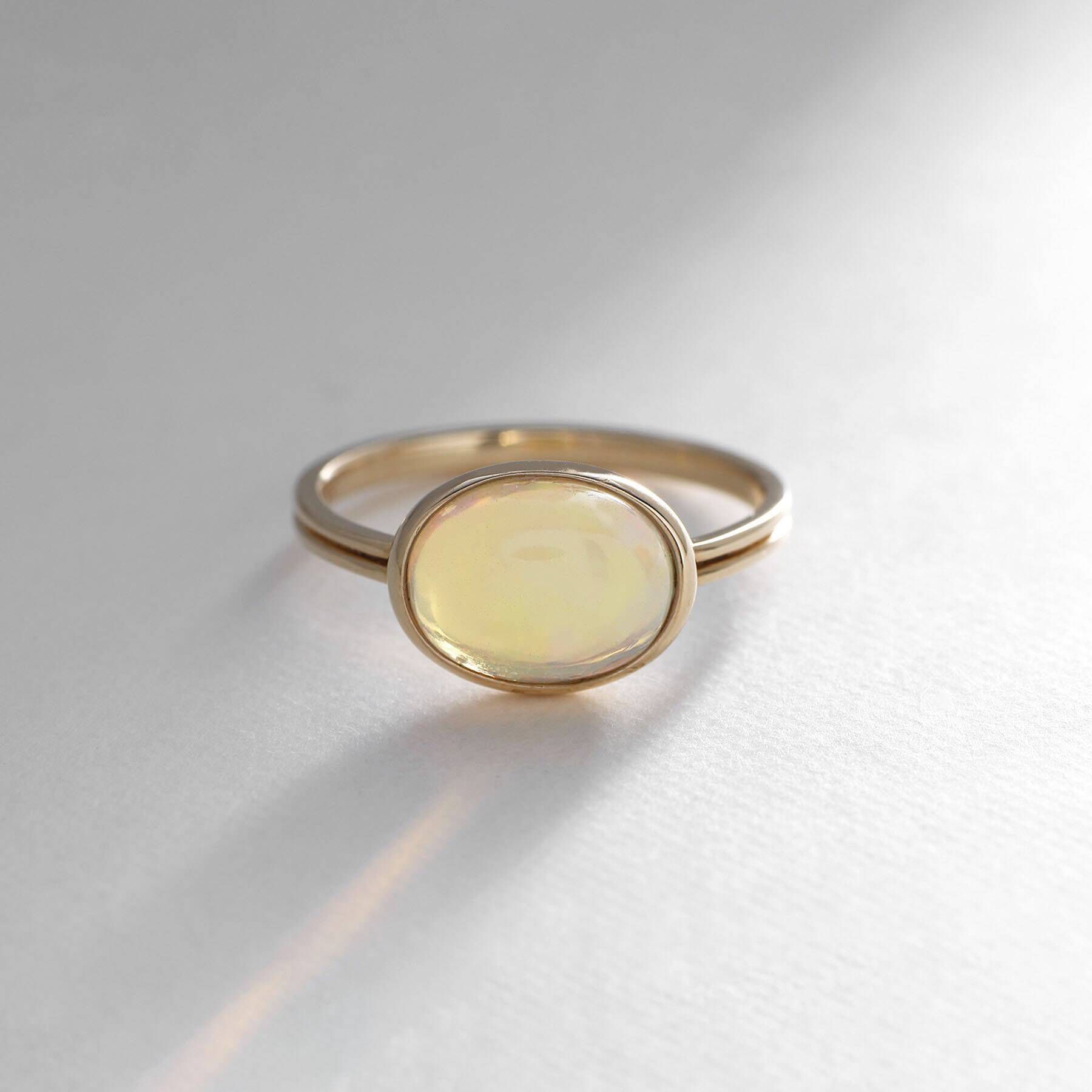 COCOSHNIK「K10エチオピアオパール オーバルカボション リング」|リング|