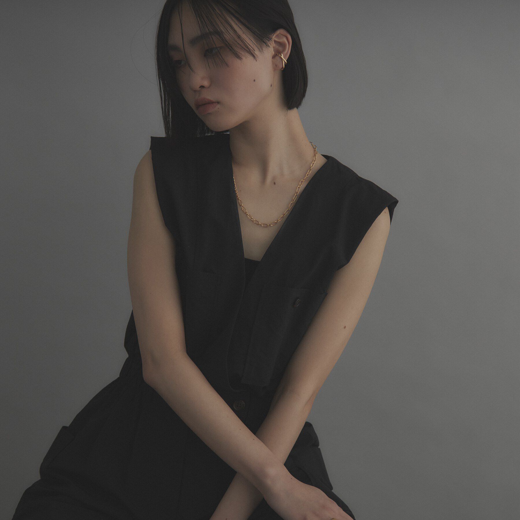 COCOSHNIK ONKITSCH「シルバー アシンメクロスイヤーカフ GP」|イヤーカフ|