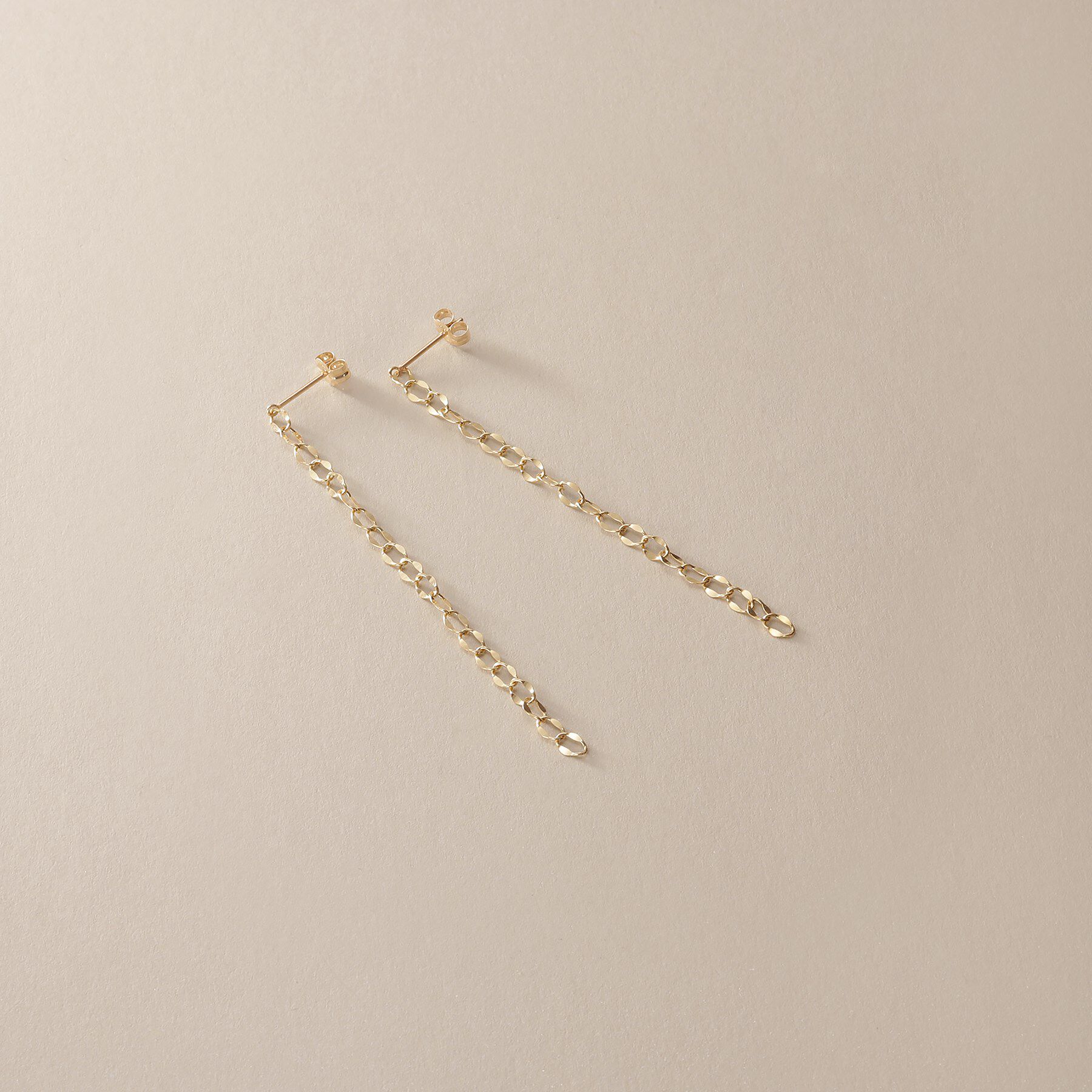 COCOSHNIK「K10シースルーフラット スタッドピアス」|ピアス|