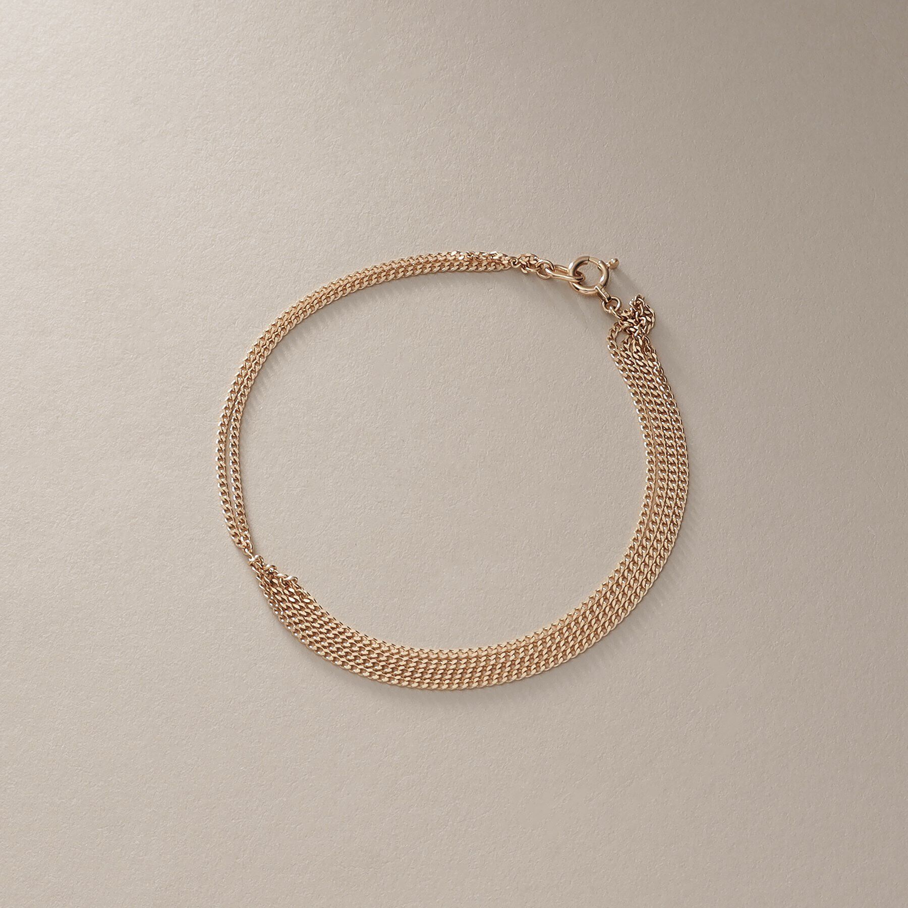 COCOSHNIK「K10キヘイアシンメトリードレープ ブレスレット」|ブレスレット・バングル|