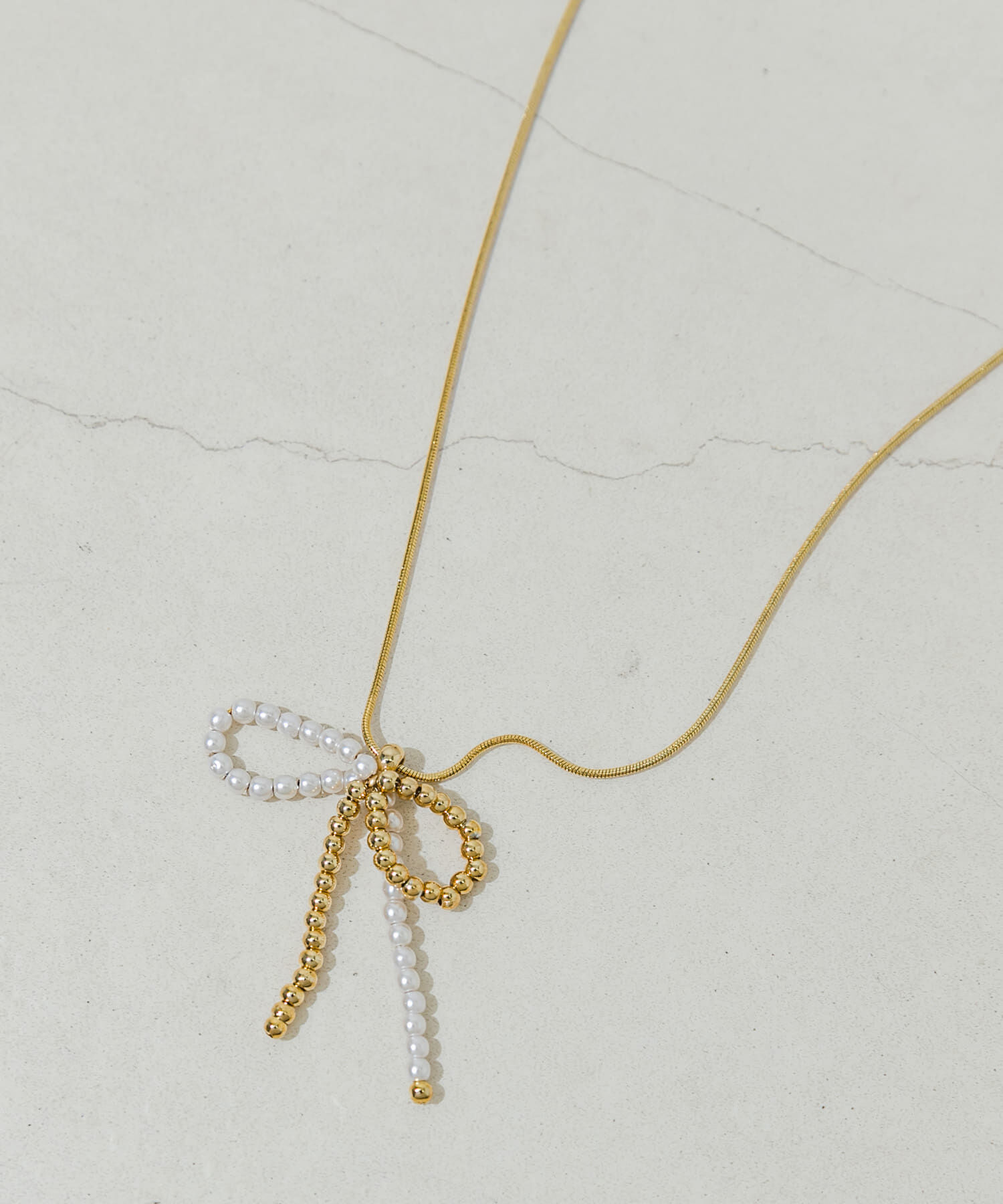 SMELLY「メタルパールビーズリボンネックレス」|ネックレス|ゴールド系その他