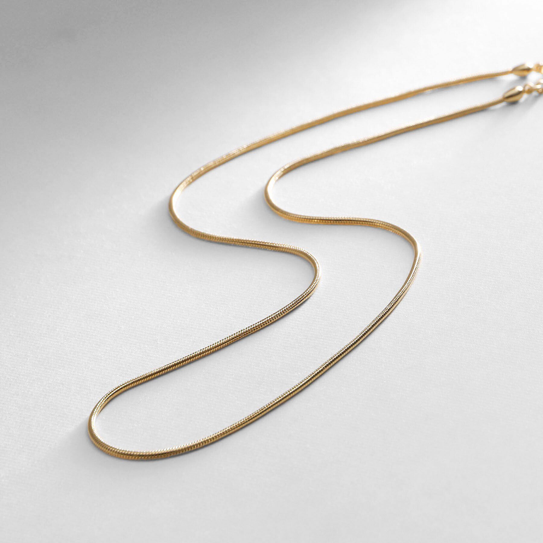 COCOSHNIK ONKITSCH「シルバー デザインチェーン スネークネックレス GP」|ネックレス|ゴールド(600)