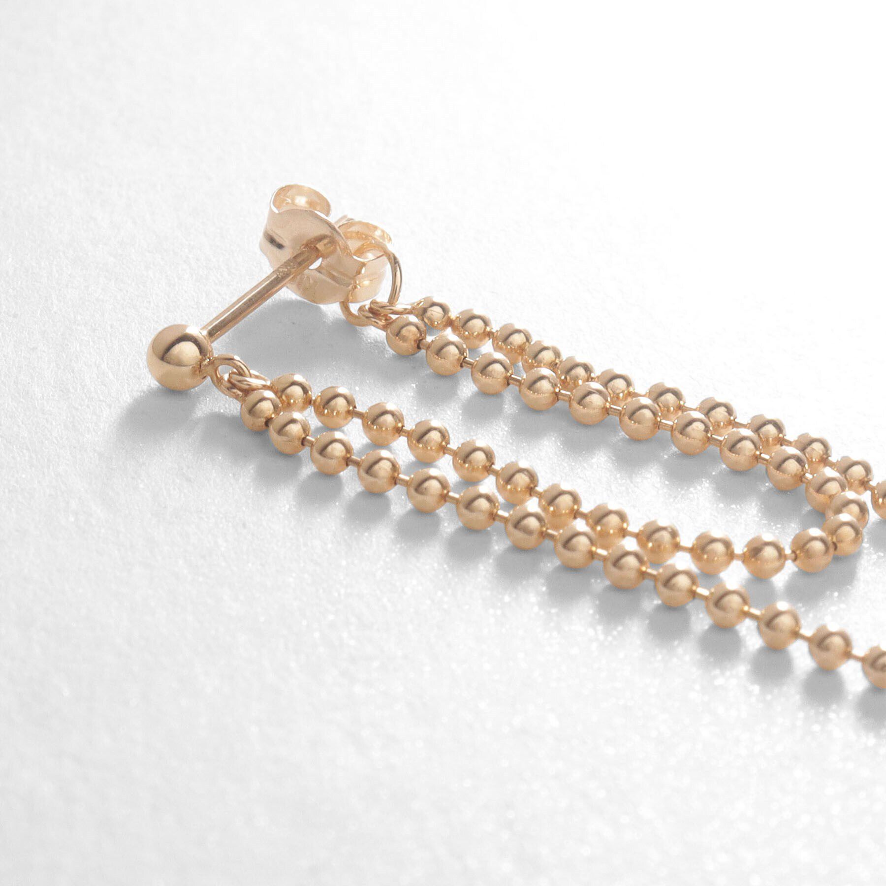 COCOSHNIK「K10ボールチェーンドレープ フープピアス」|ピアス|