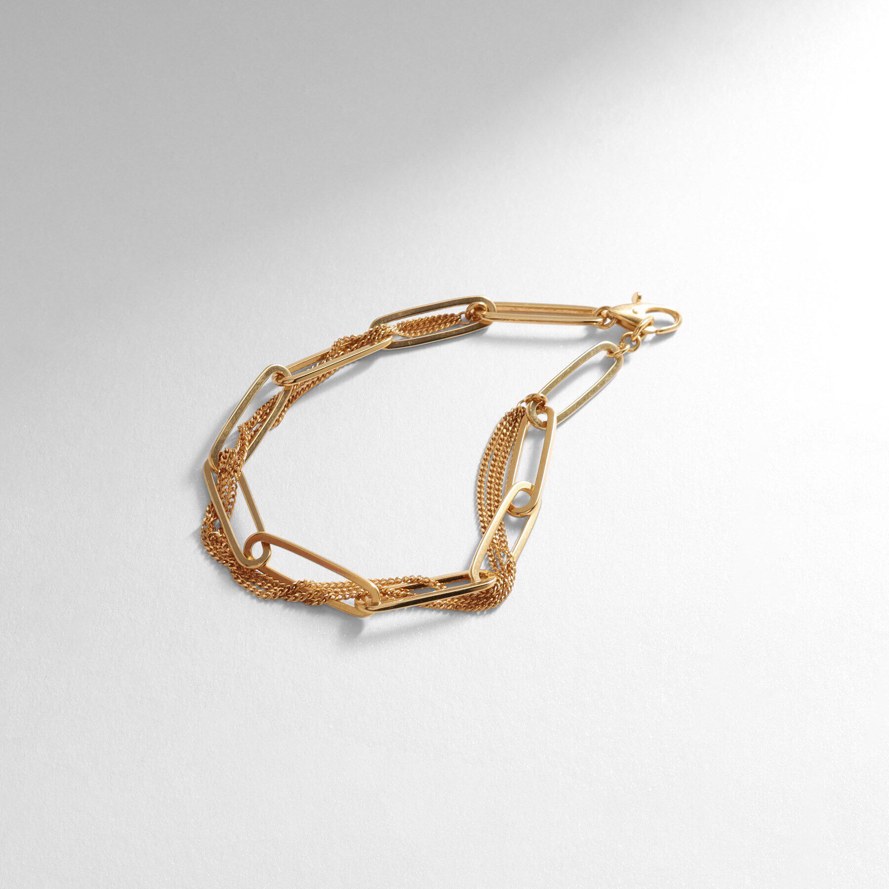 COCOSHNIK ONKITSCH「シルバー ミックスチェーン フラットカーブ スルー ブレスレット GP」|ブレスレット・バングル|ゴールド(600)