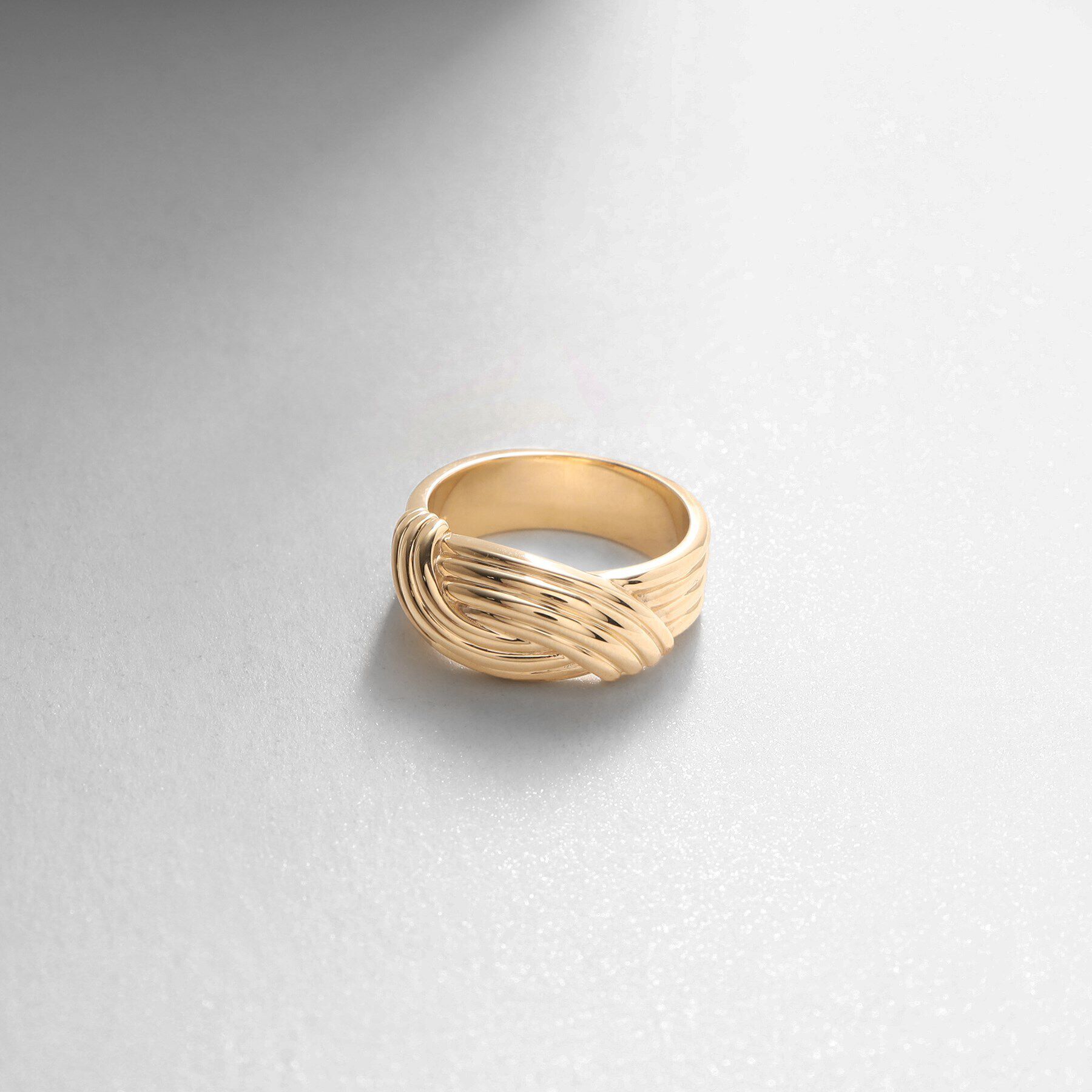 COCOSHNIK「K10ストライプパターンノット リング」|リング|