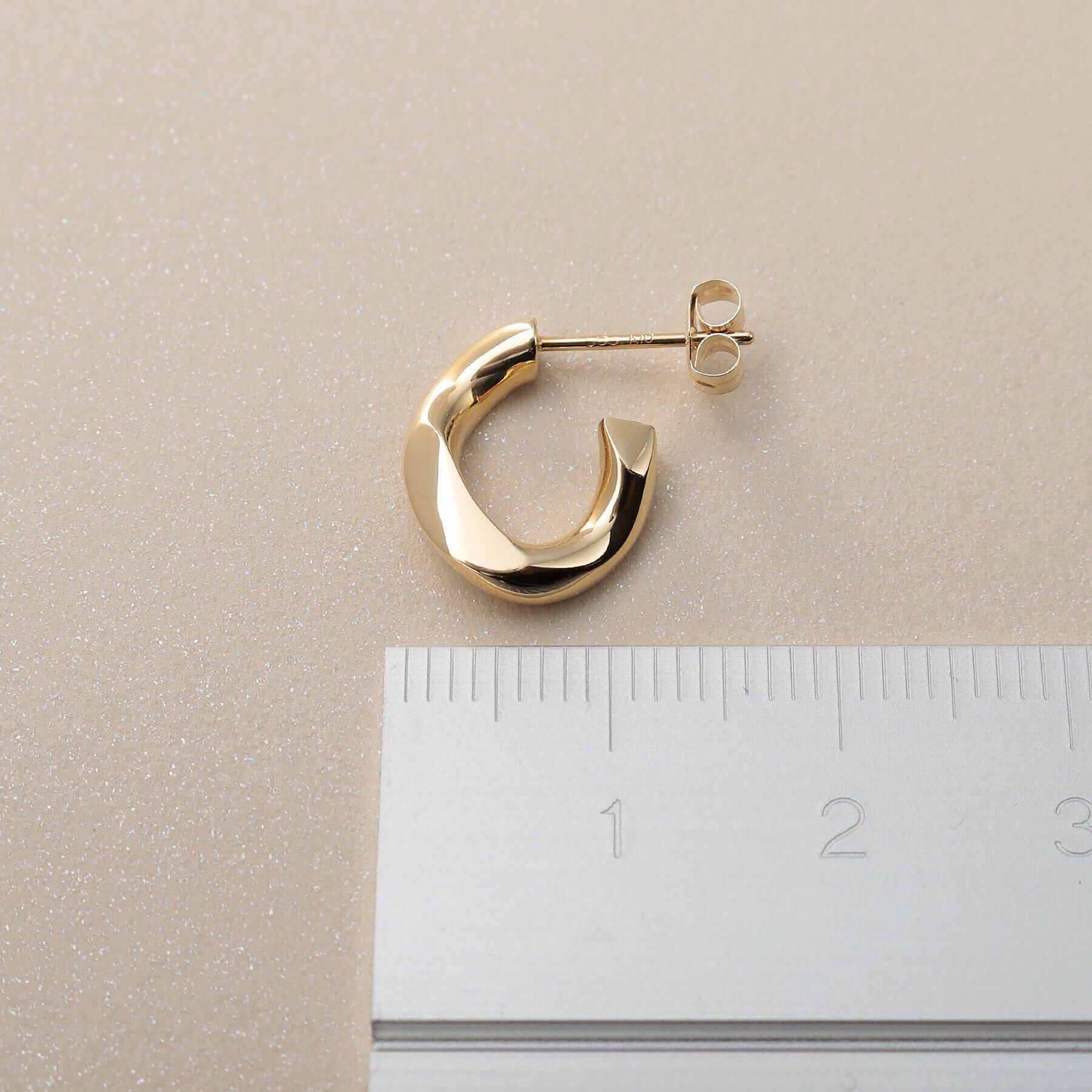 COCOSHNIK「K10キヘイモチーフ スタッドピアス」|ピアス|