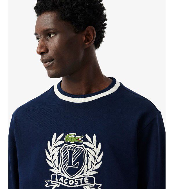 LACOSTE「裏パイル ハンドステッチ風ヴィンテージ フレンチグラフィックステッチ スウェットプルオーバー」|スウェット・ジャージ|